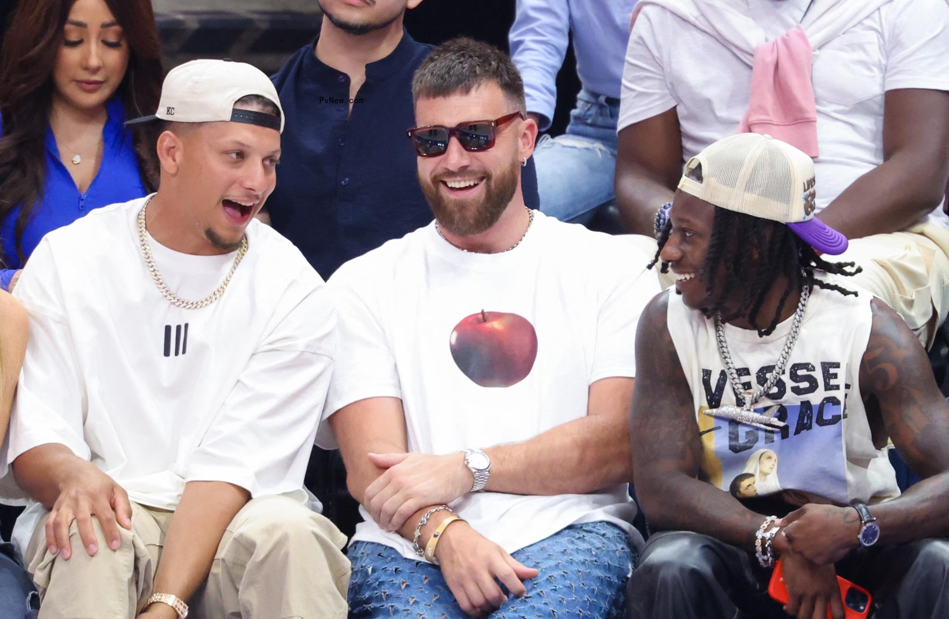 Travis Kelce Patrick Mahomes and Marquis Hollywood Brown at an NBA game.
