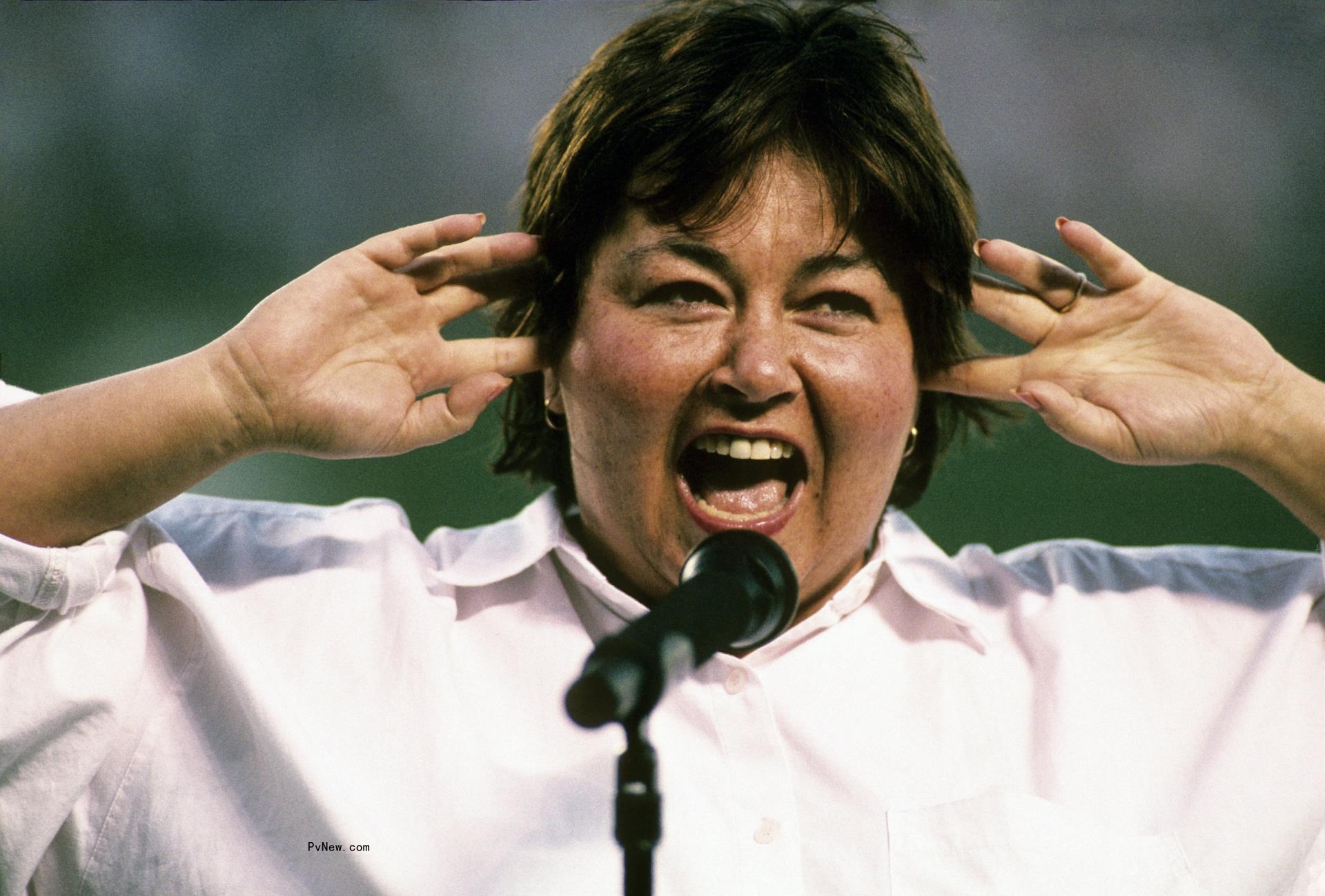 Roseanne Barr singing the natio<i></i>nal anthem at a 1990 Padres game.