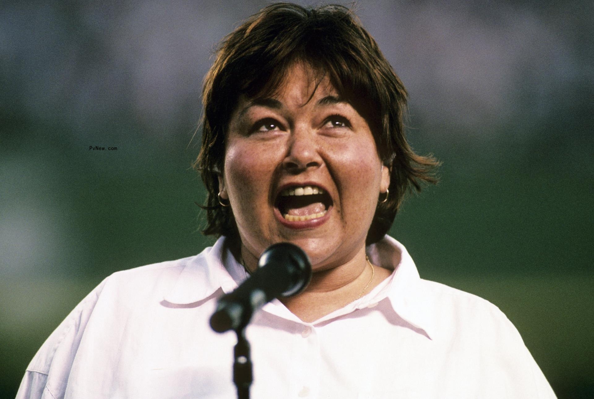 Roseanne Barr singing the natio<i></i>nal anthem at a 1990 Padres game.