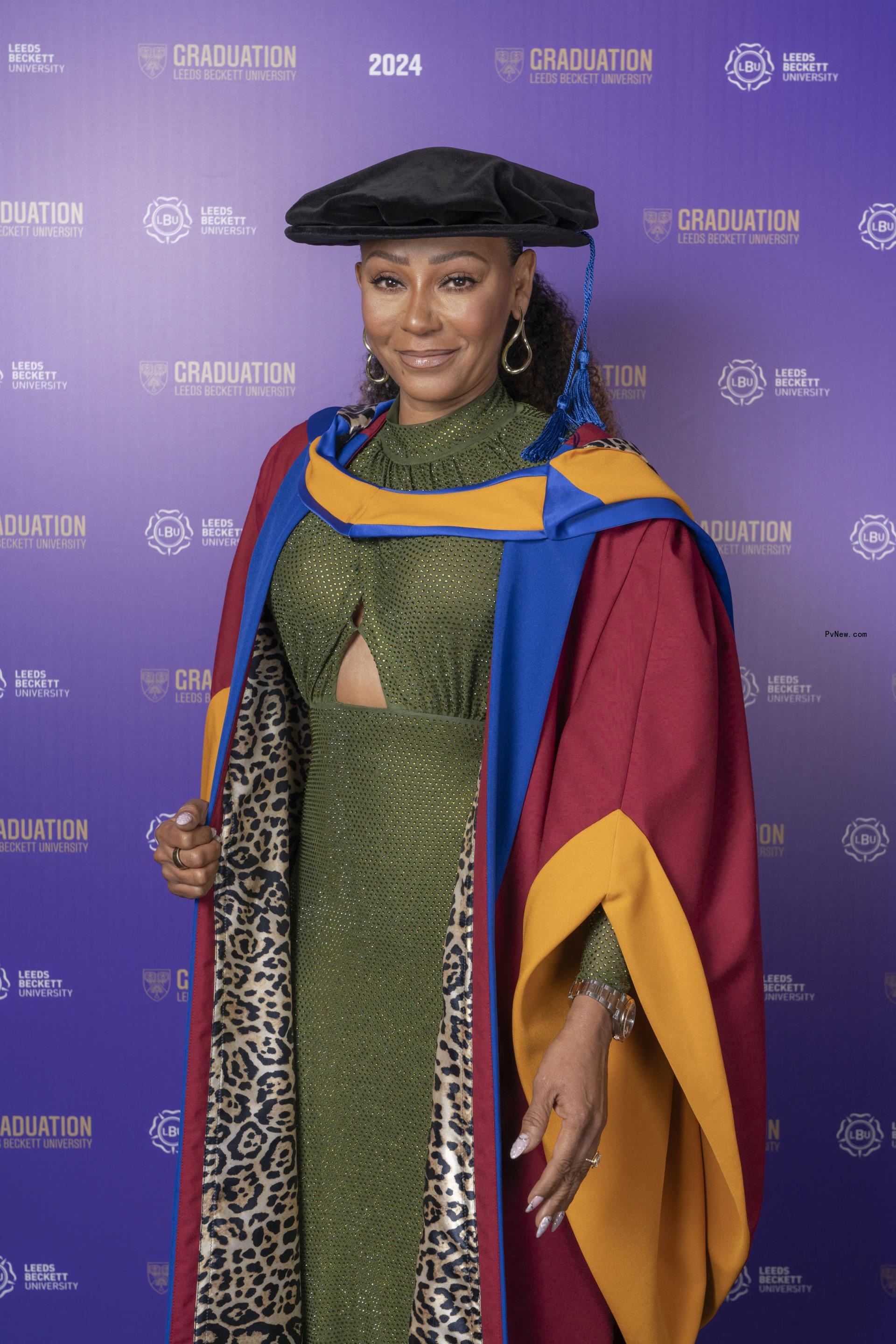 Mel B channels her Spice Girls style in a leopard-print graduation gown while receiving an ho<i></i>norary doctorate