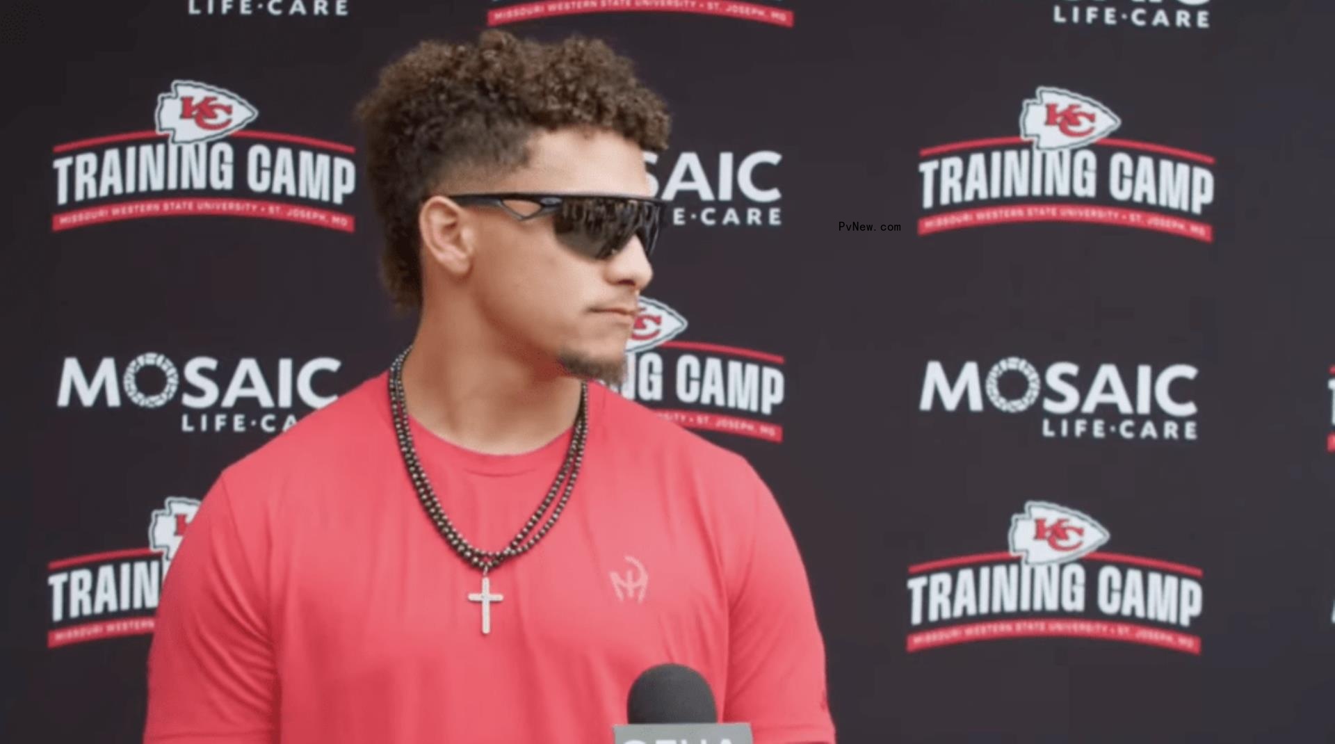 Patrick Mahomes speaking at a press conference