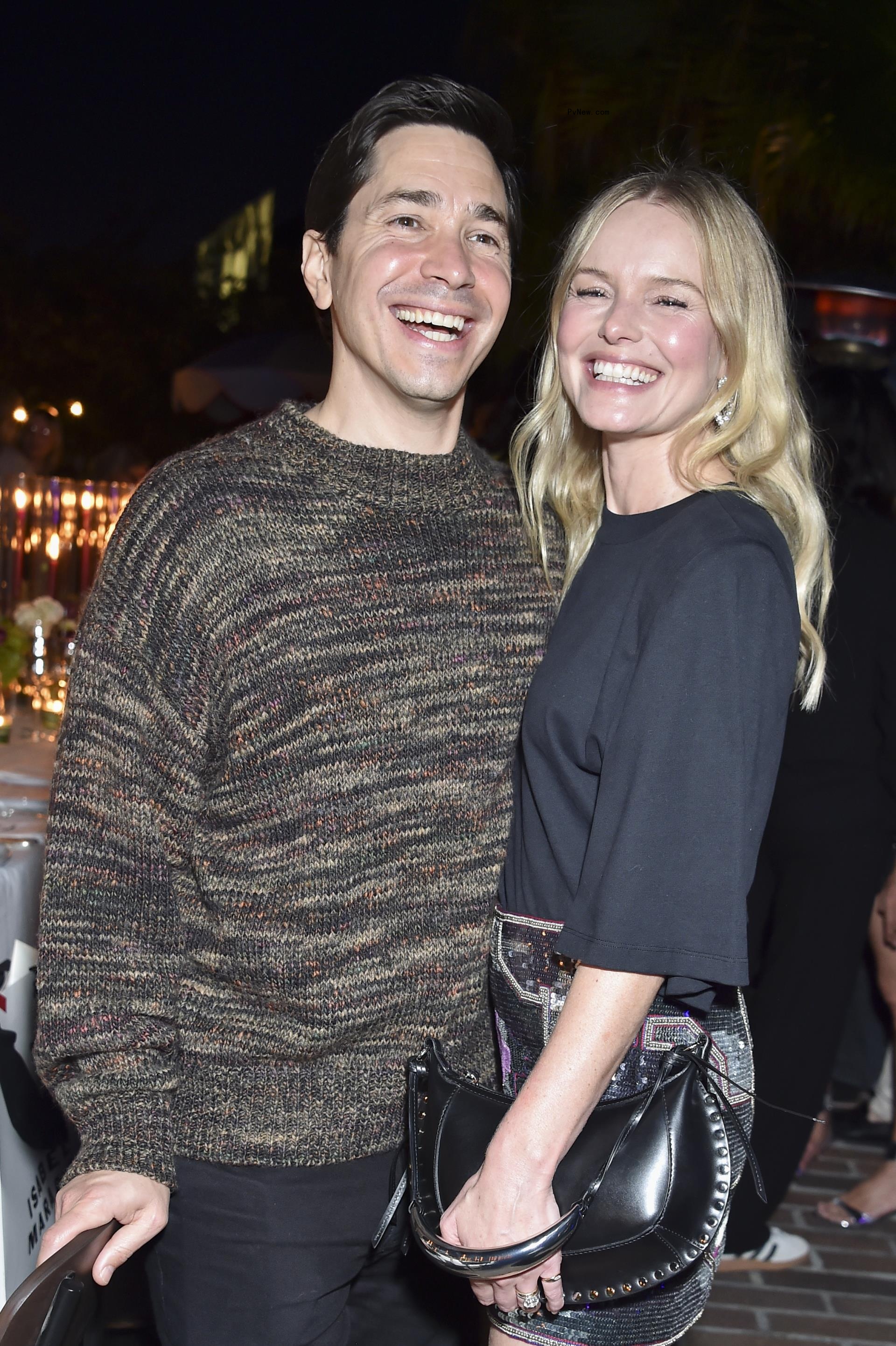 Justin Long and Kate Bosworth posing