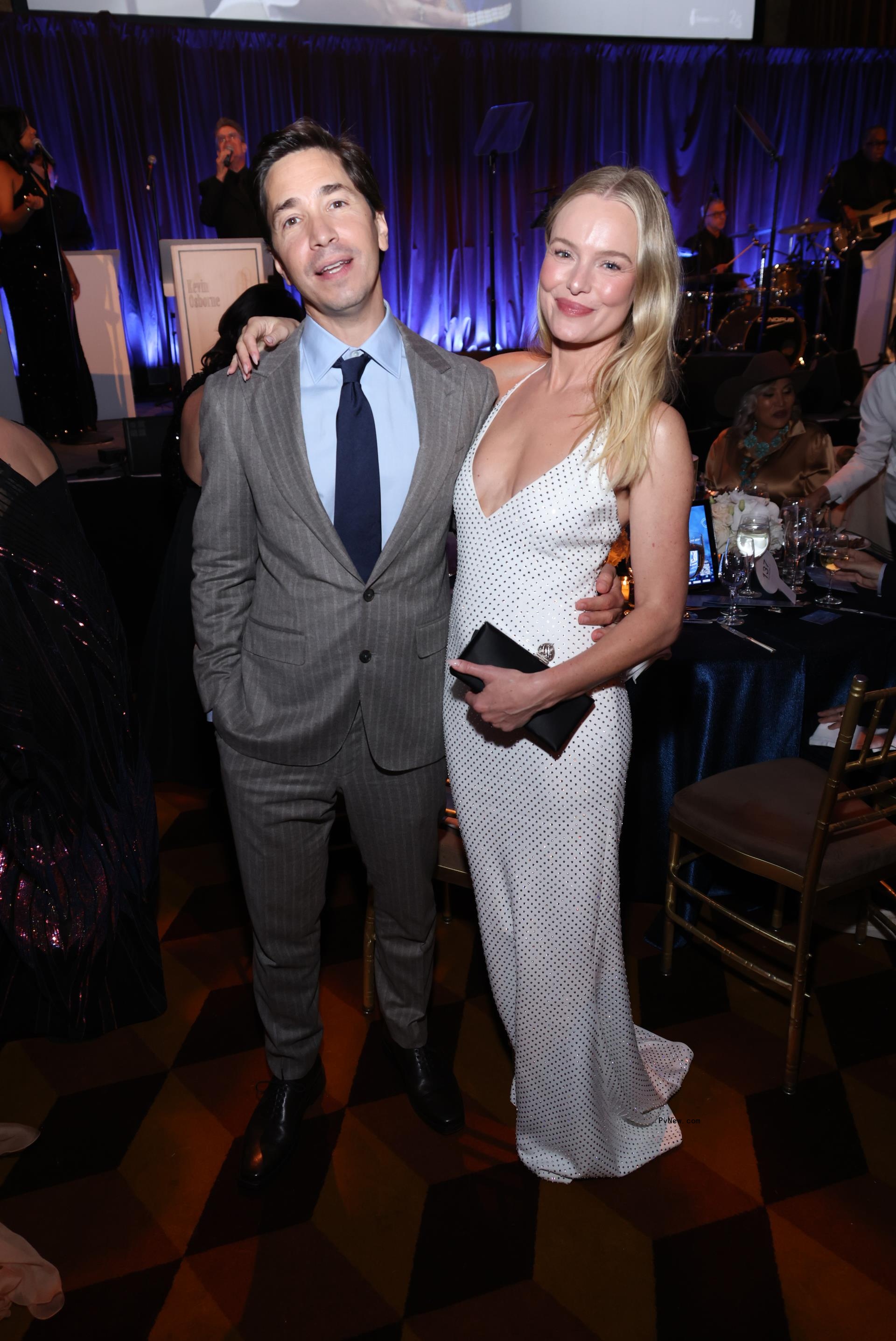Justin Long and Kate Bosworth posing