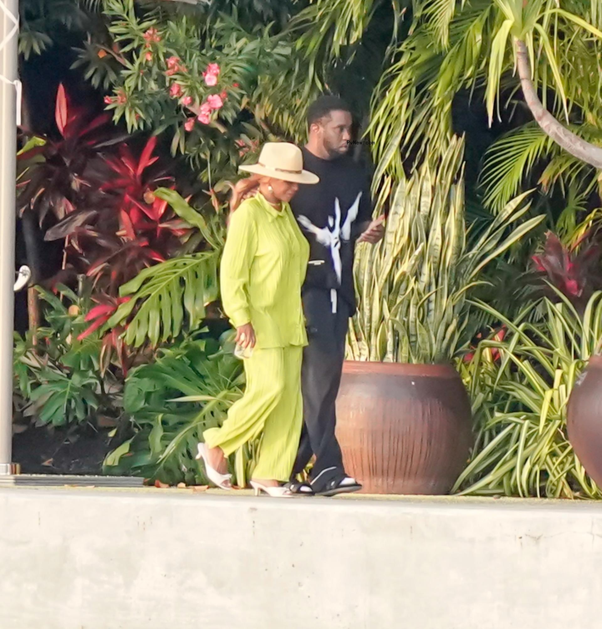 diddy and his mom walking
