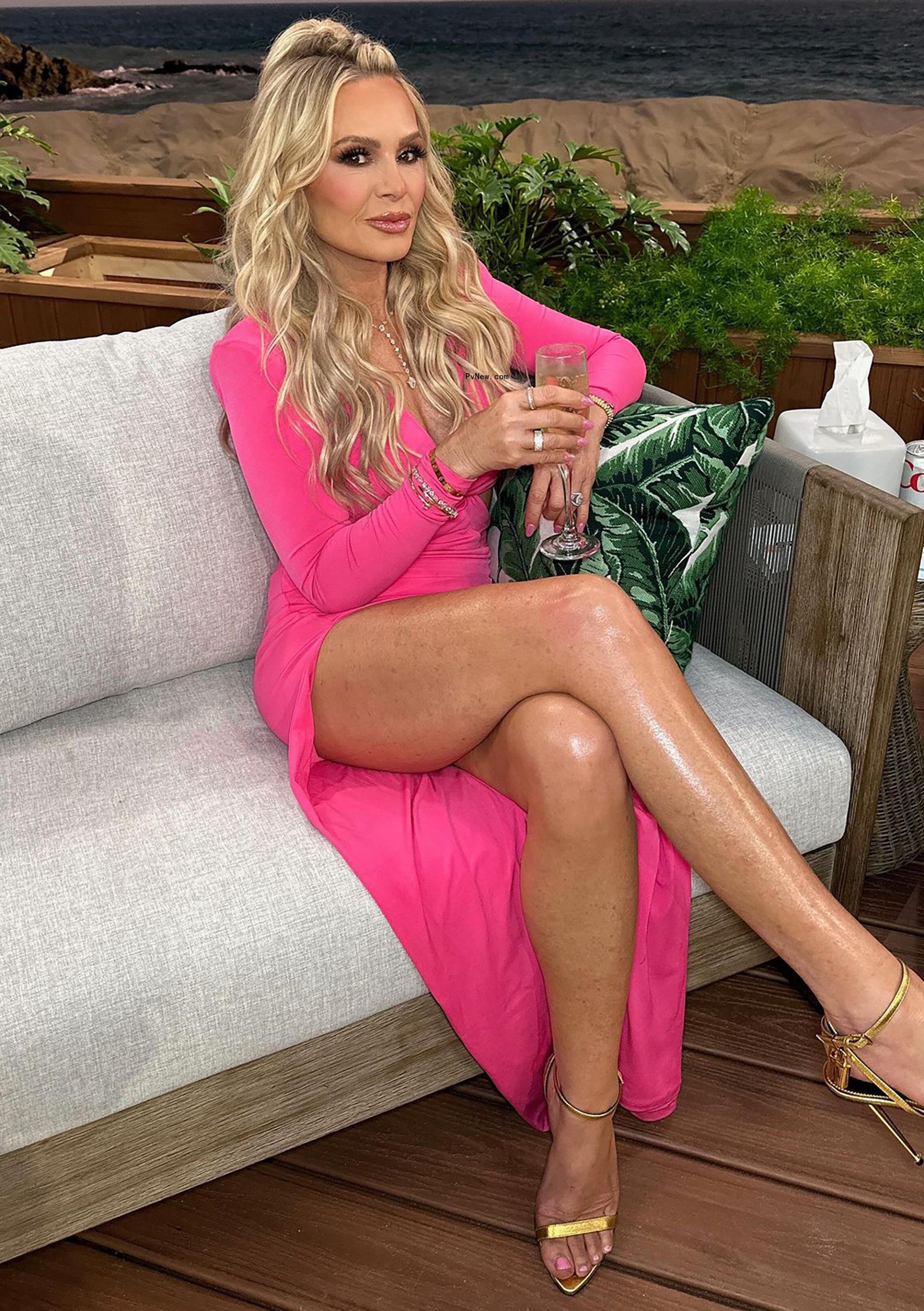Tamra Judge sitting on a chair