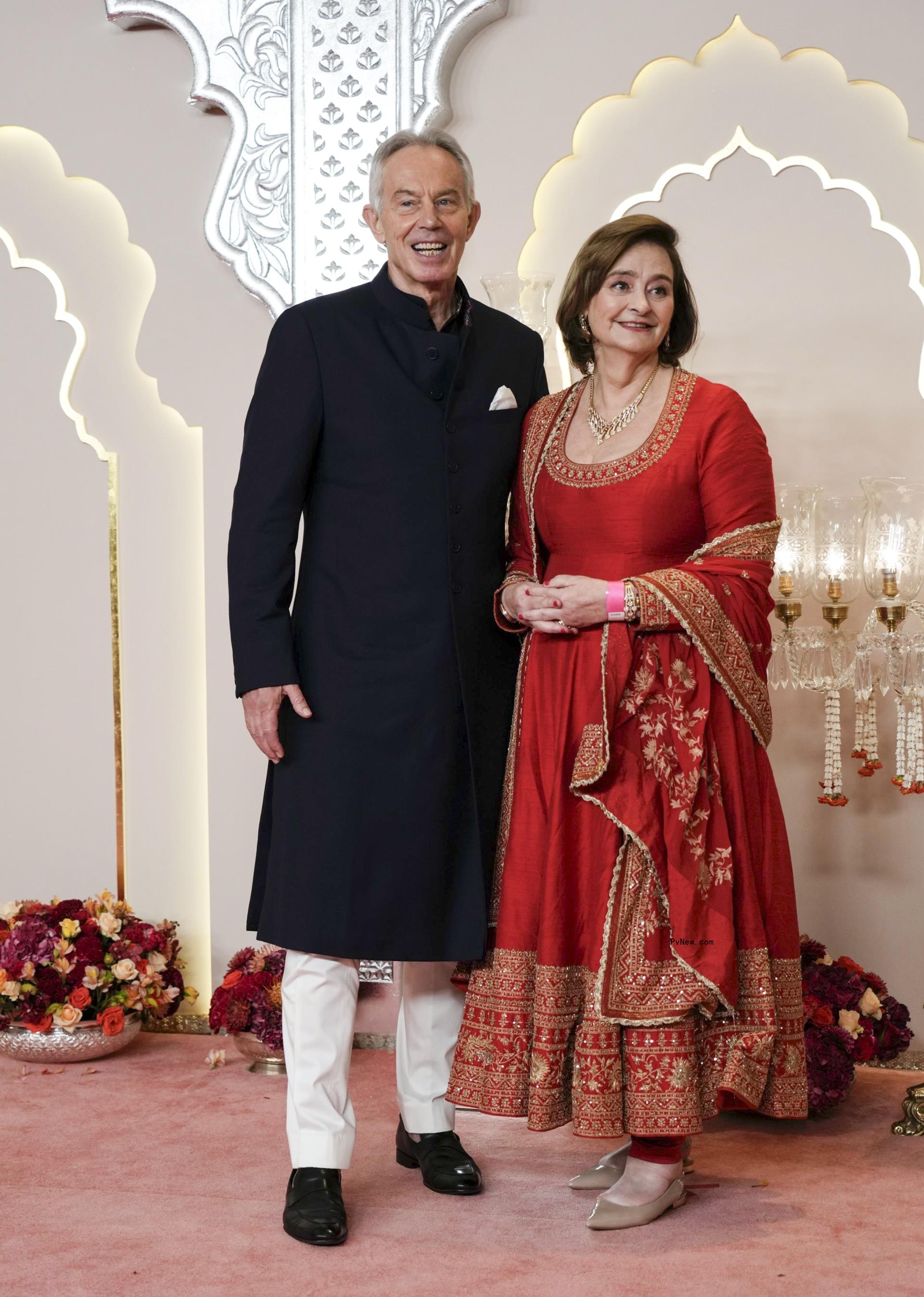 Tony Blair and his wife attend Ambani wedding.