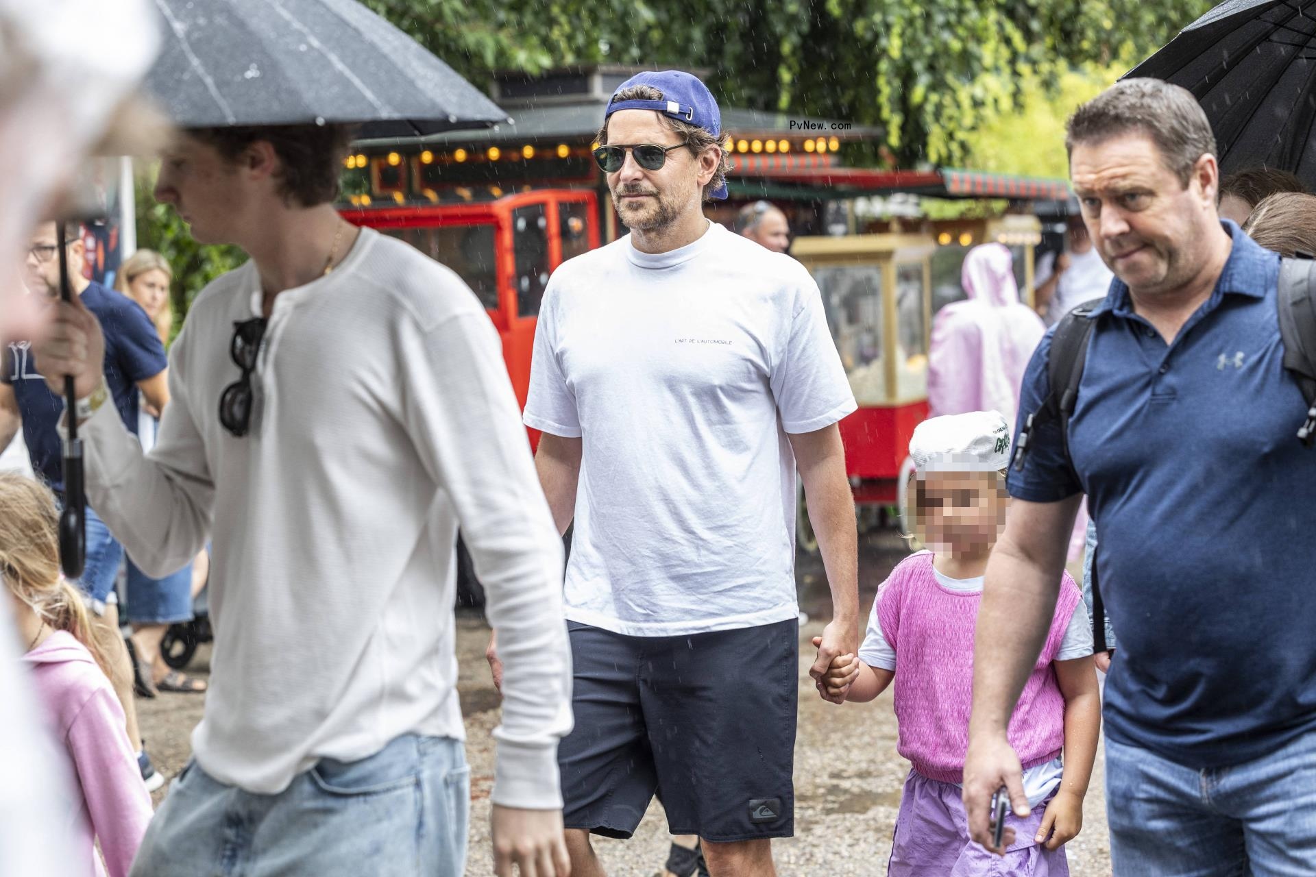 Bradley Cooper with his daughter at an amusement park