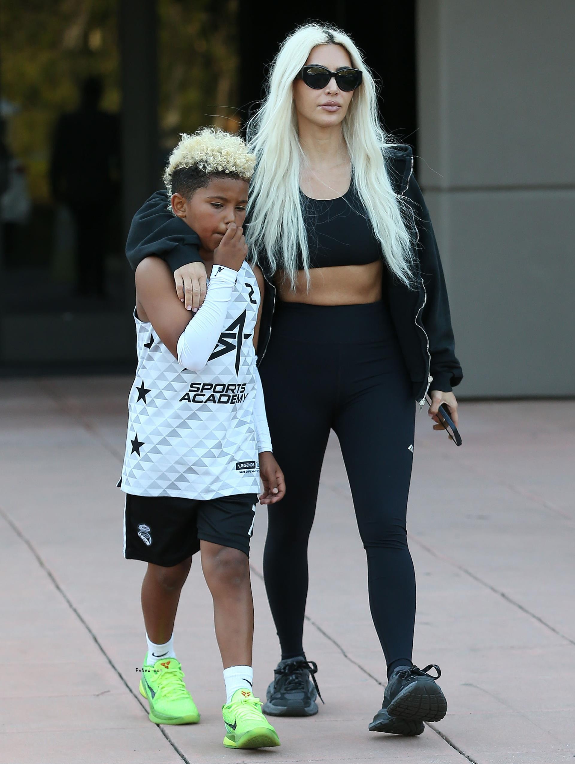 Kim Kardashian and son Saint leaving his game.