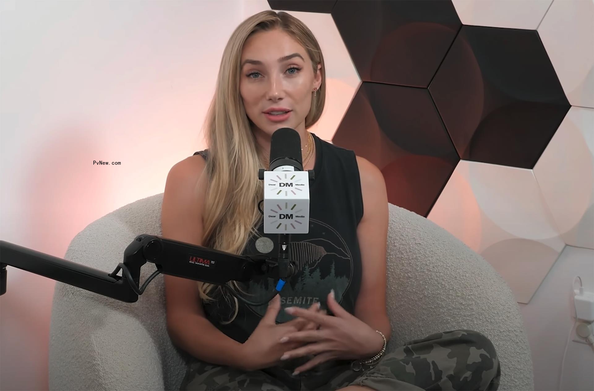aurora culpo talking into a microphone