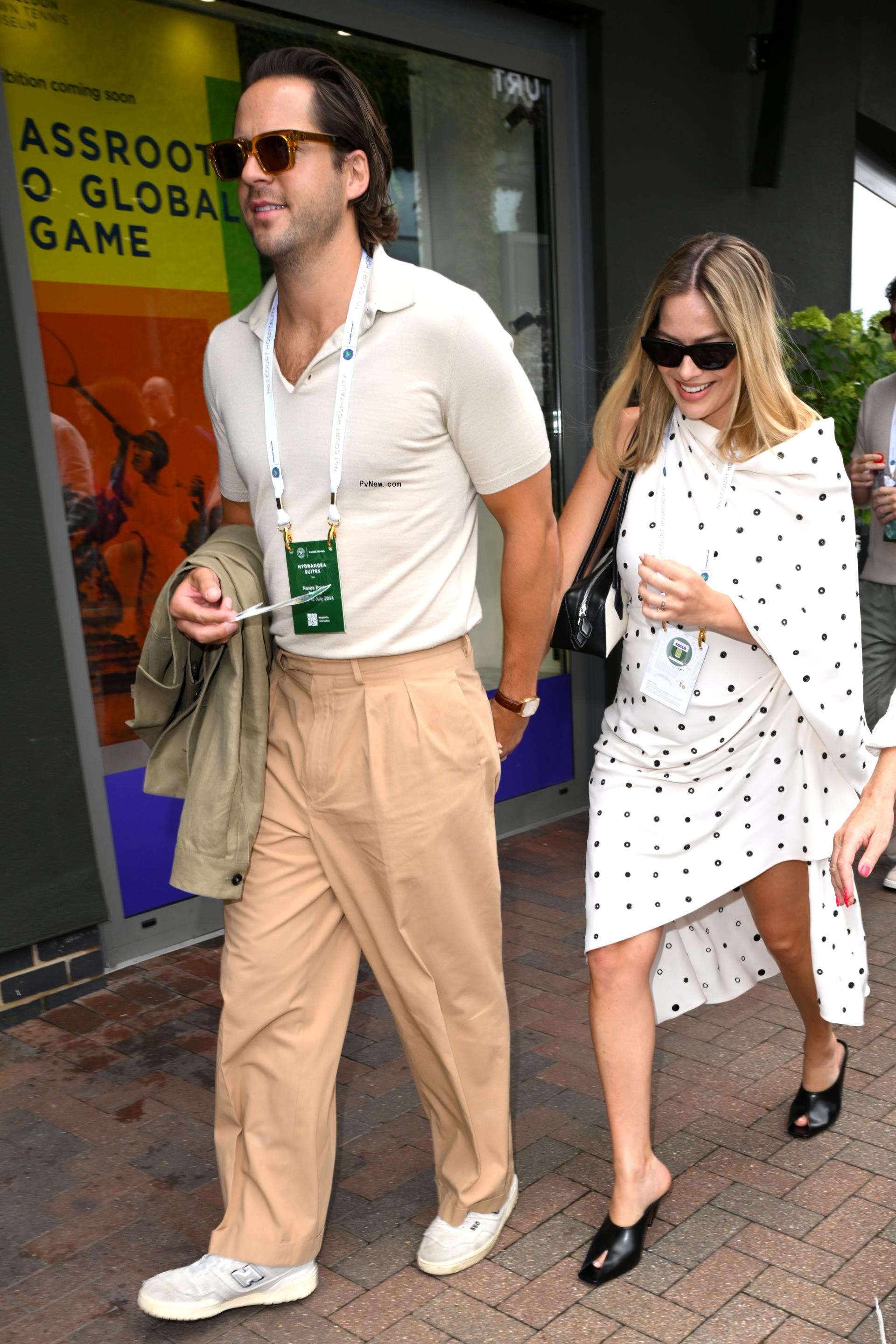 Tom Ackerley and Margot Robbie
