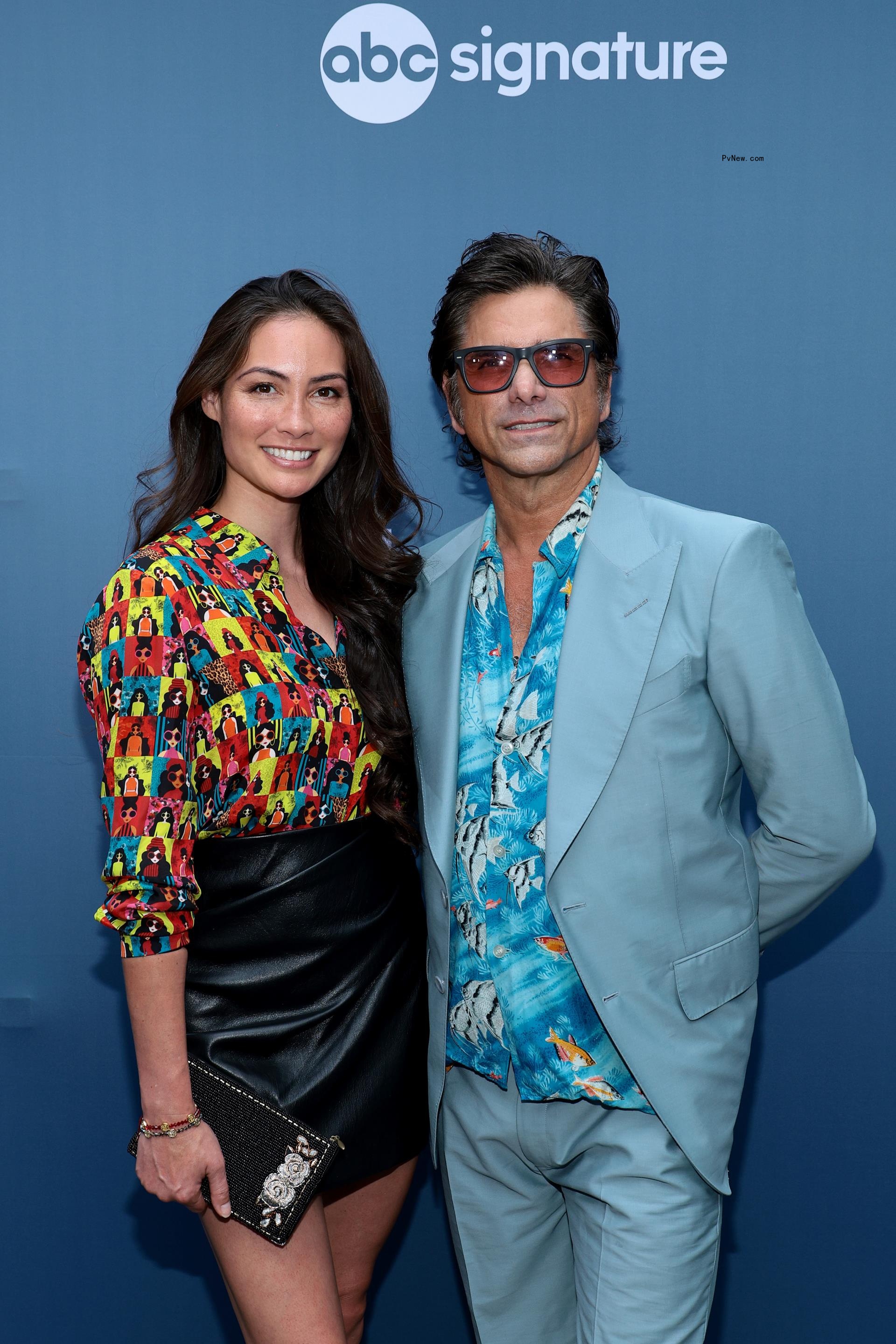 John Stamos and Caitlin McHugh.