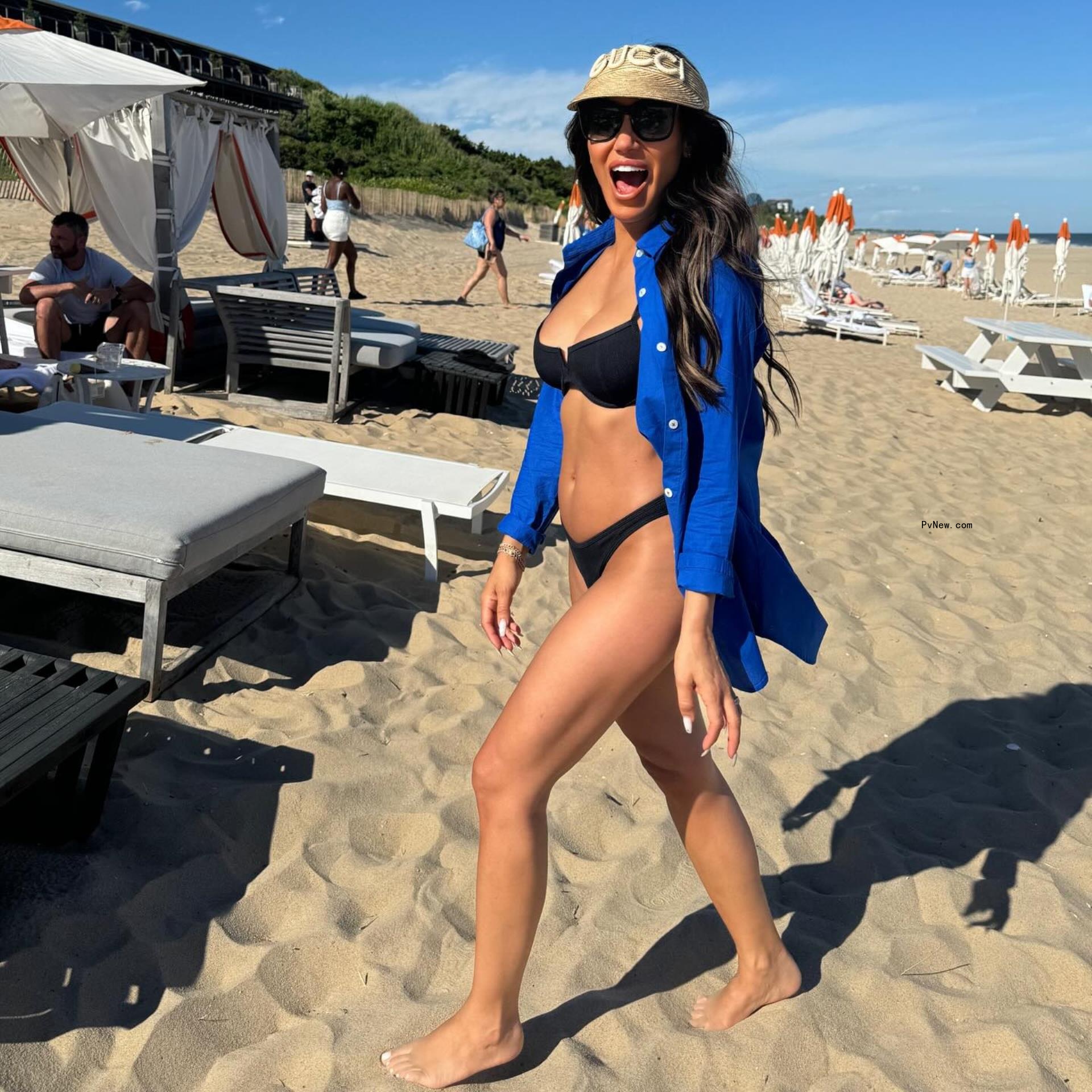 Melissa Gorga walking on the beach