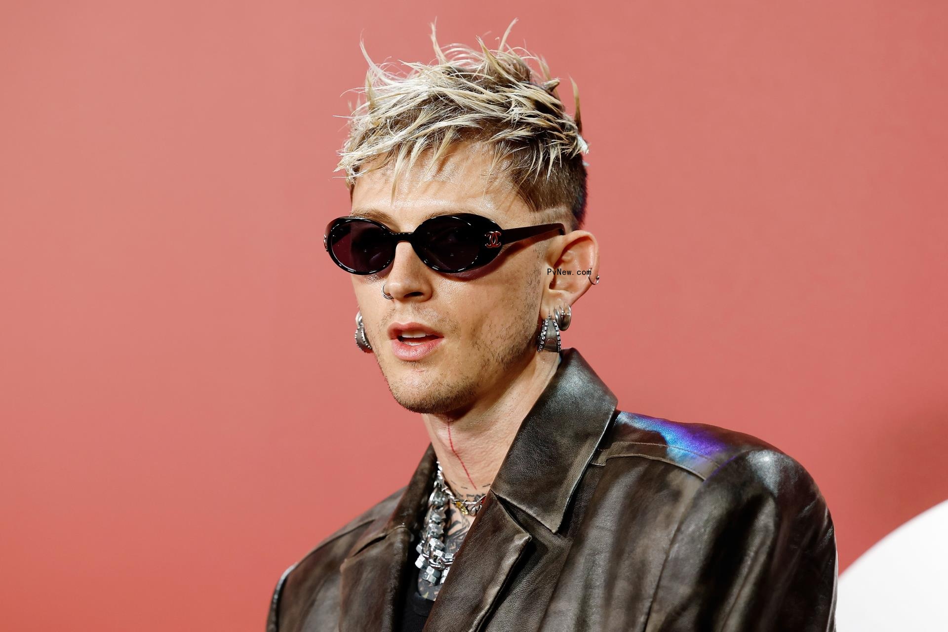 MGK Enlists Jelly Roll for John Denver-Inspired New Single ‘Lo<i></i>nely Road’