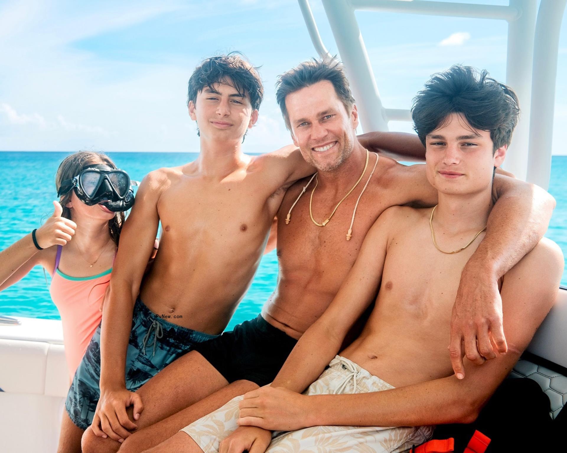 tom brady on a boat with his two sons and daughter