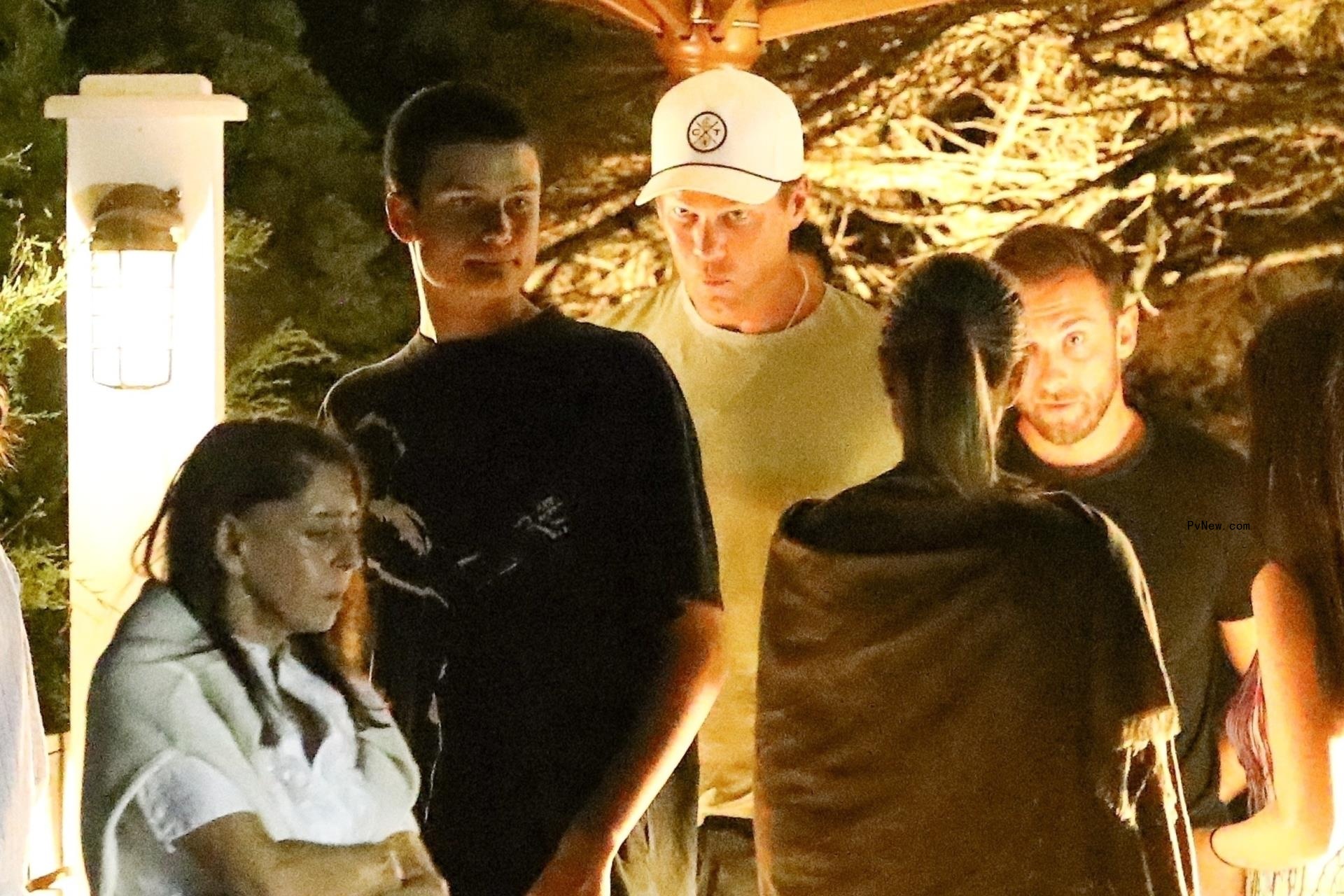 tom brady keeping his head low with his son jack