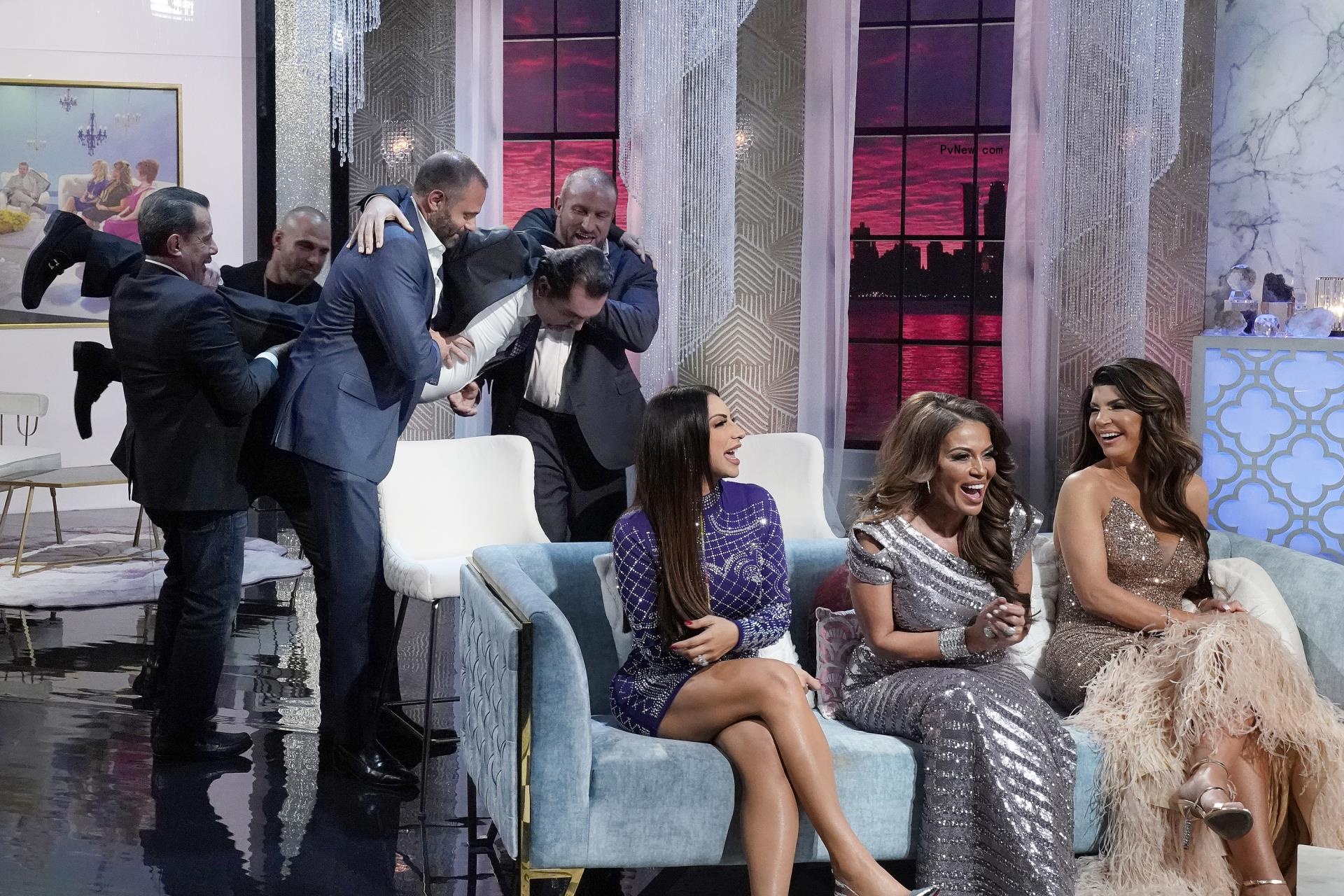 Joe Benigno, Joe Gorga, Evan Goldschneider, Bill Aydin, Frank Catania, Jennifer Aydin, Dolores Catania, Teresa Giudice sitting at the 