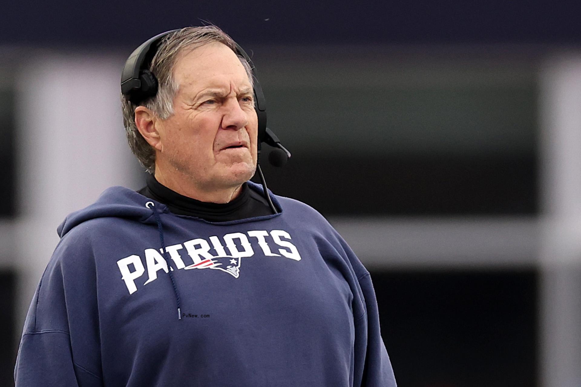 Bill Belichick on a football field.  