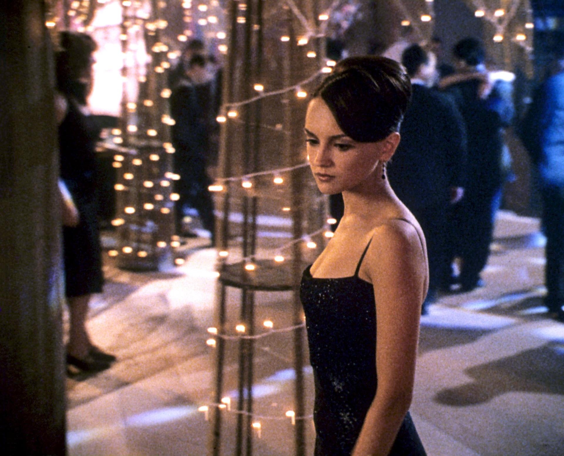 Cook wears a dress to a dance in