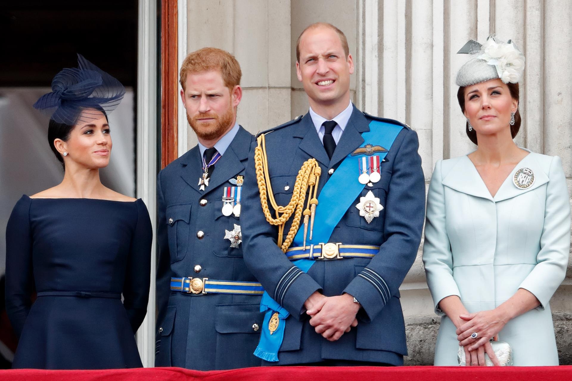 Meghan Markle and Prince Harry stand alo<i></i>ngside Prince William and Kate Middleton on the balcony of Buckingham Palace on July 10, 2018.