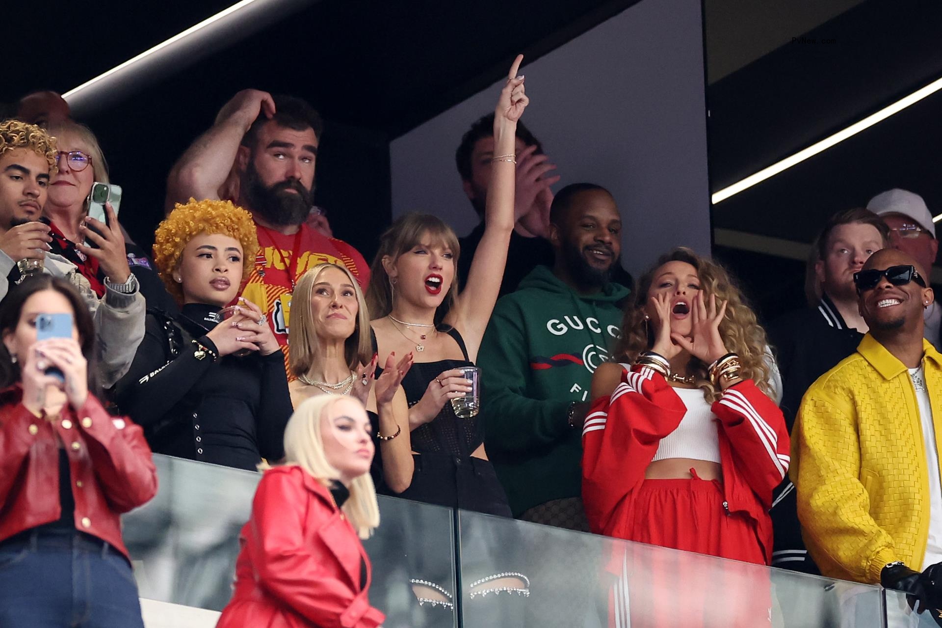 Taylor Swift and Blake Lively cheer at the 2024 Super Bowl while standing with Ice Spice.