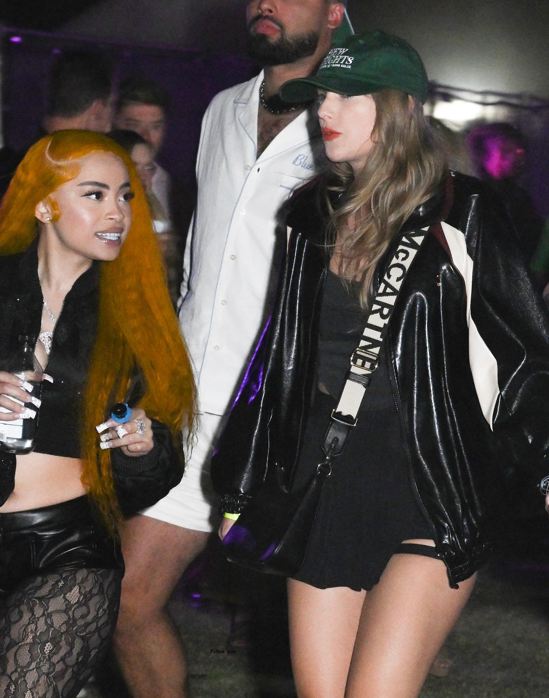 Ice Spice and Taylor Swift arrive at the Neon Carnival held during the Coachella Music and Arts Festival on April 13, 2024.
