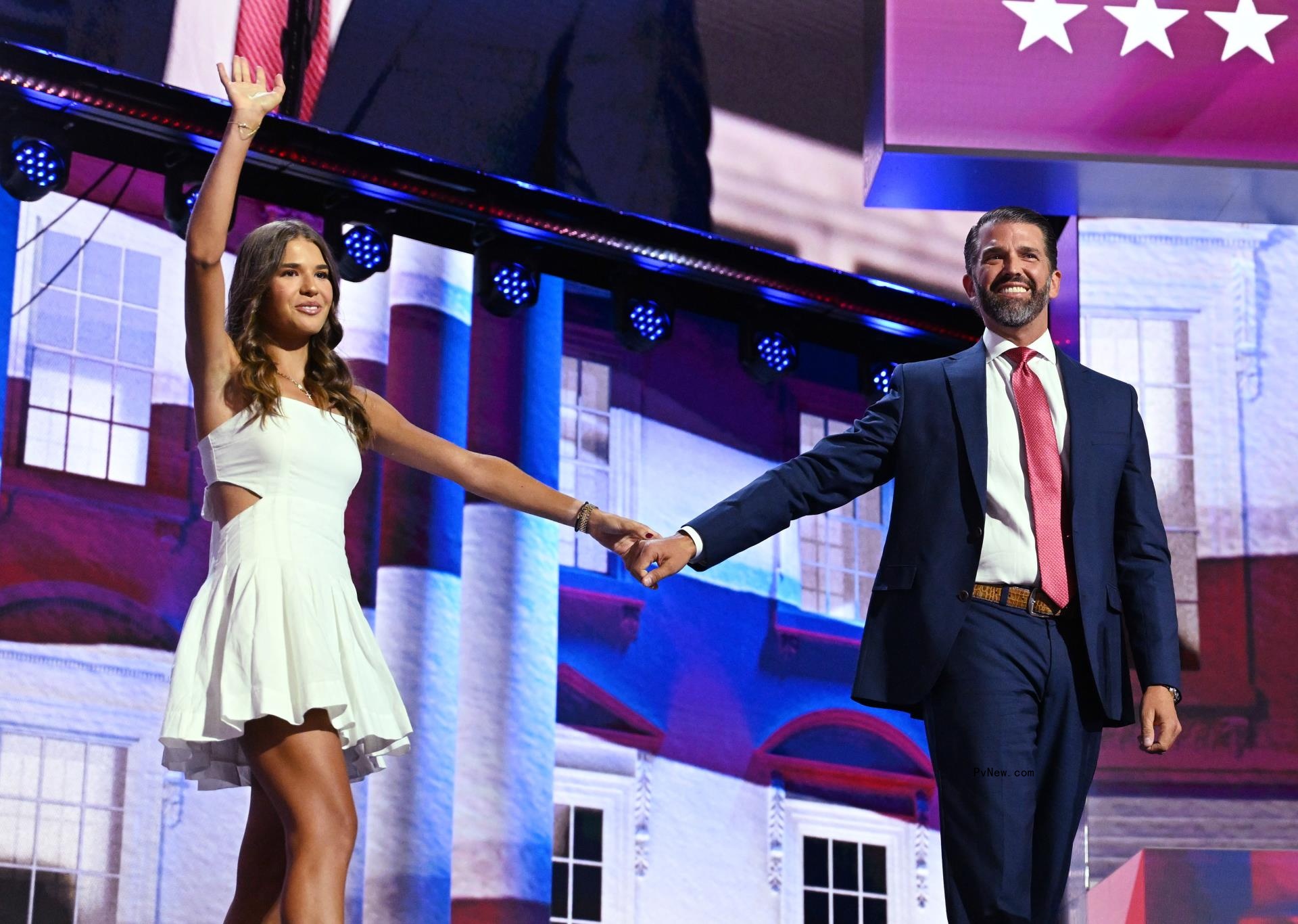 Kai Madison Trump and Do<i></i>nald J. Trump, Jr standing on stage at the RNC