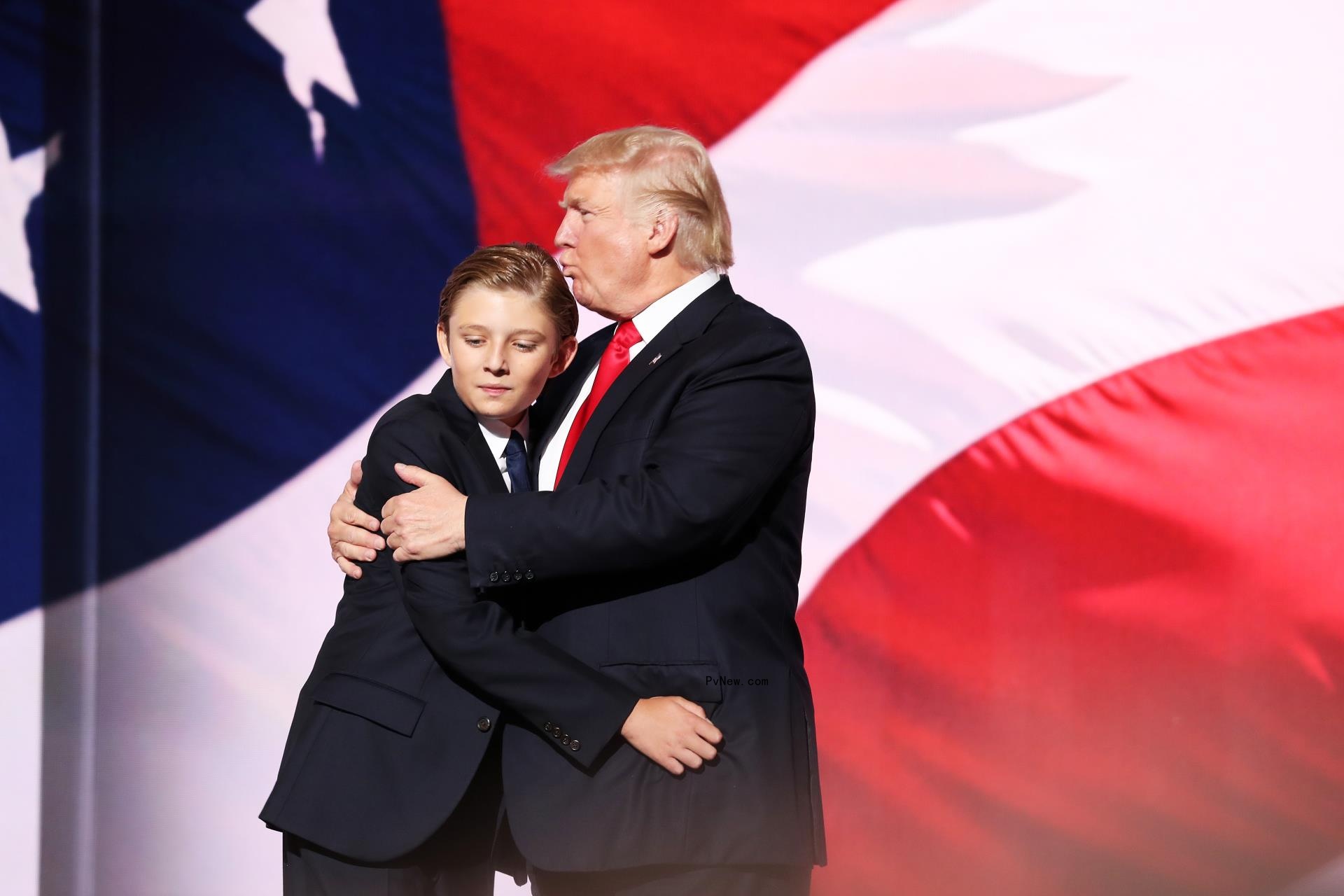 Do<i></i>nald Trump hugging Barron Trump