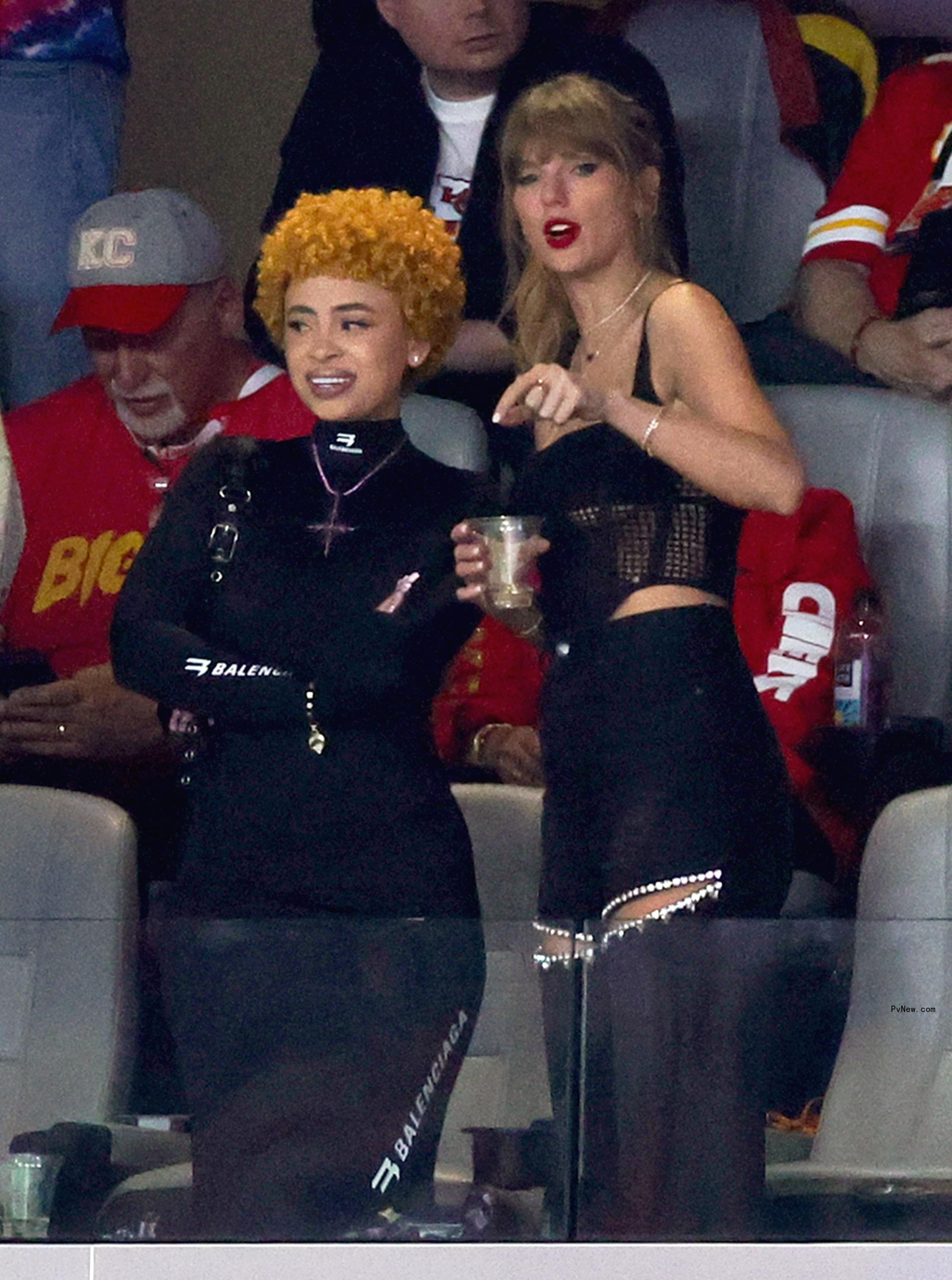 Ice Spice and Taylor Swift talking at the Super Bowl