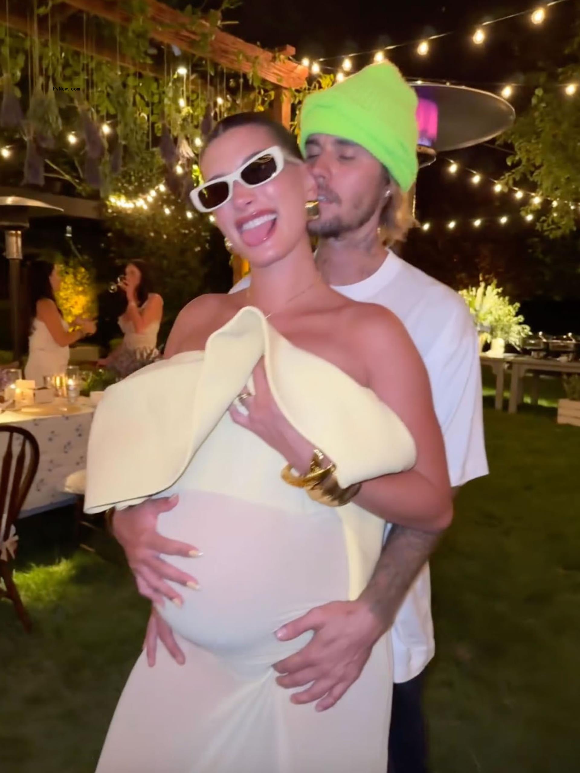 Justin Bieber cradling Hailey Bieber's baby bump in a sweet Instagram video.