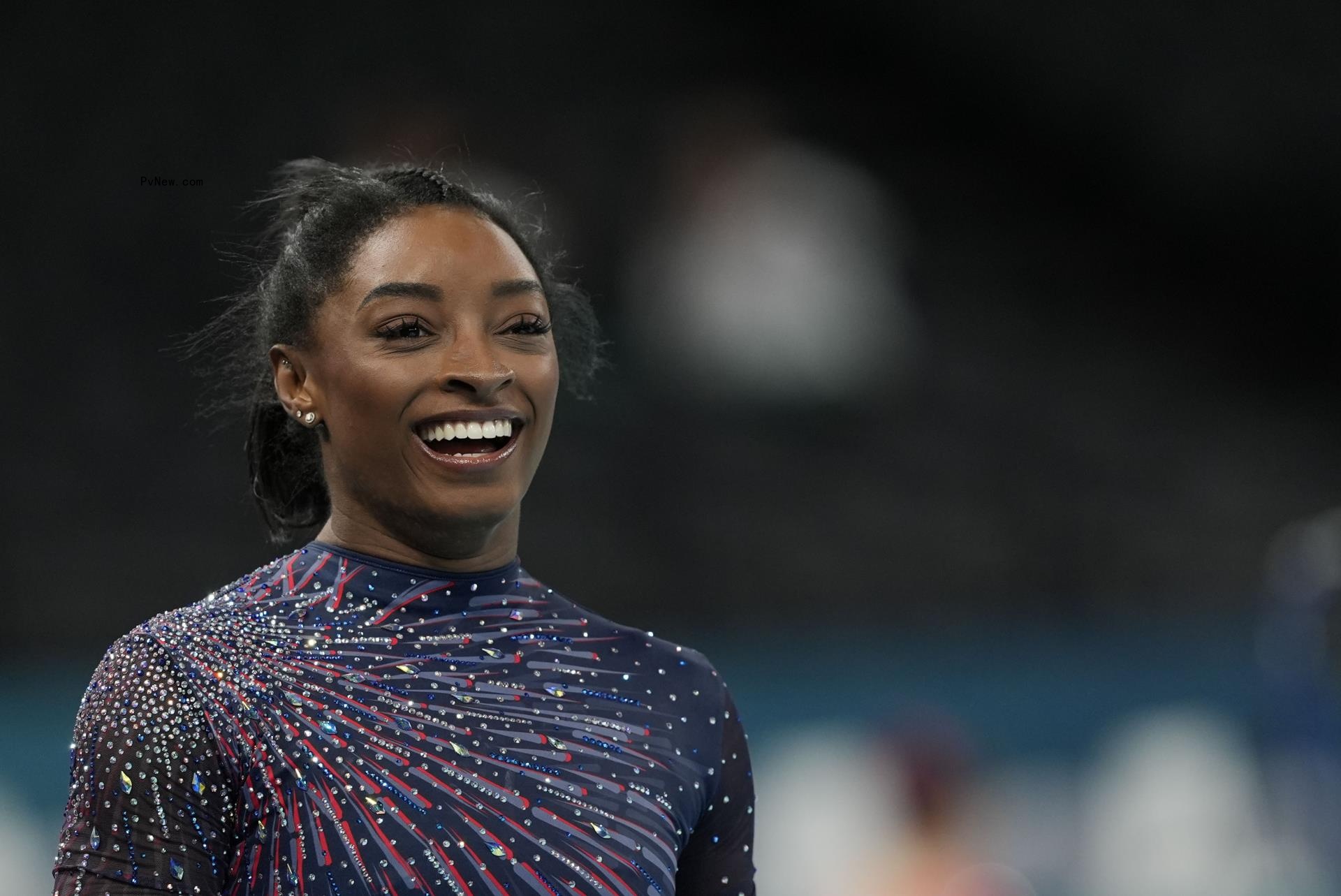 Simone Biles smiling.