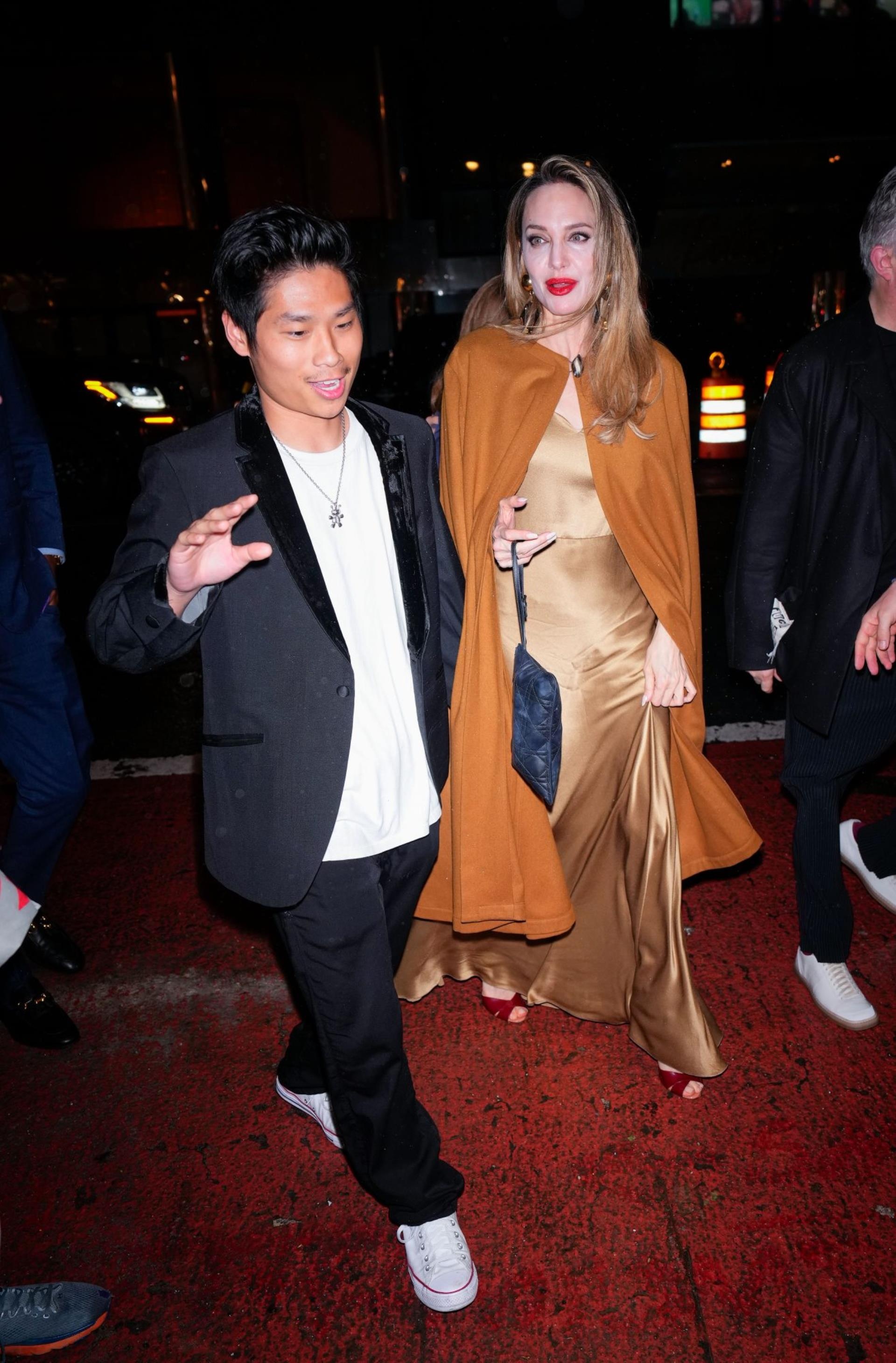 Angelina Jolie and Pax Jolie-Pitt arrive at the afterparty of 