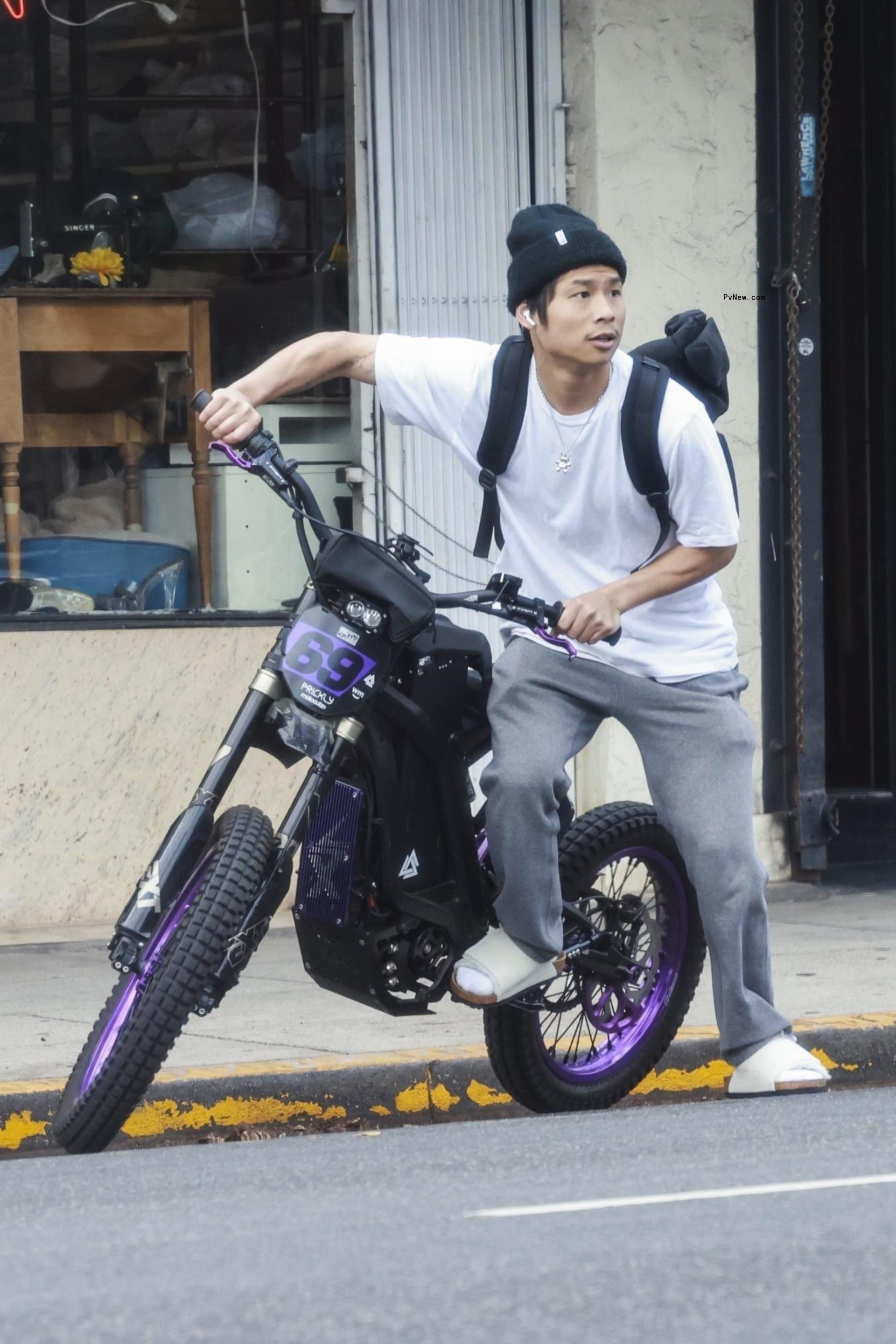 Pax Jolie-Pitt pictured with his electric bike in Los Angeles.