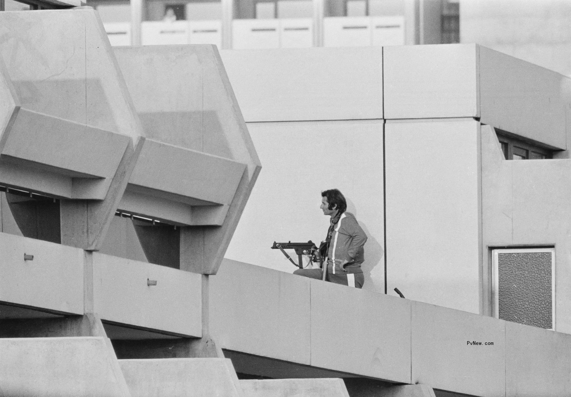 An armed police officer maintains surveillance in the Athletes' Village during the 1972 Munich Olympic Games in Munich, West Germany.