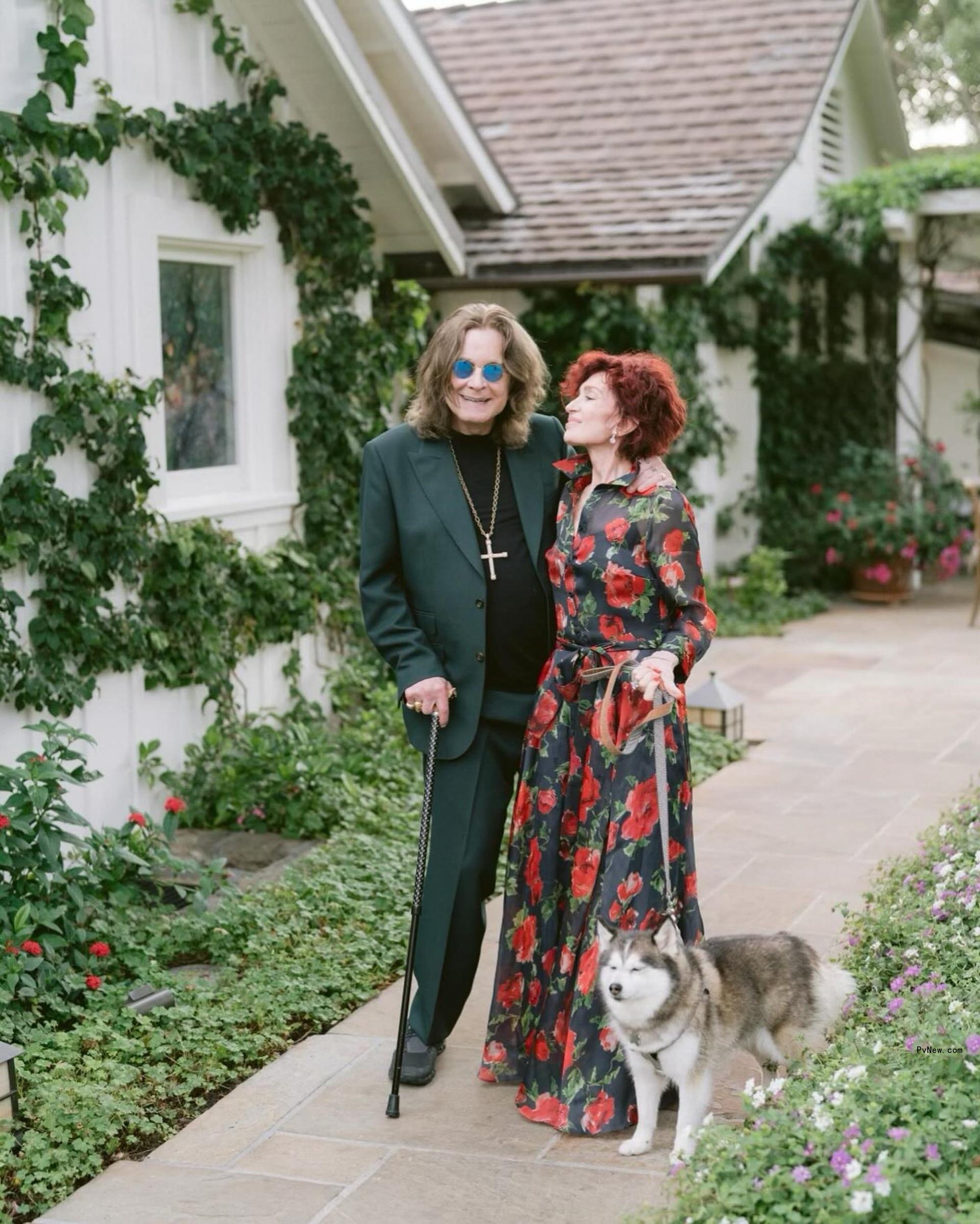Sharon and Ozzy Osbourne alo<i></i>ngside their dog.