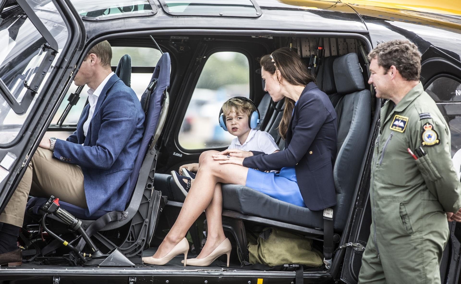Prince William in the pilot seat of a helicopter while Kate Middleton and their son George sat in the back on July 8, 2016.