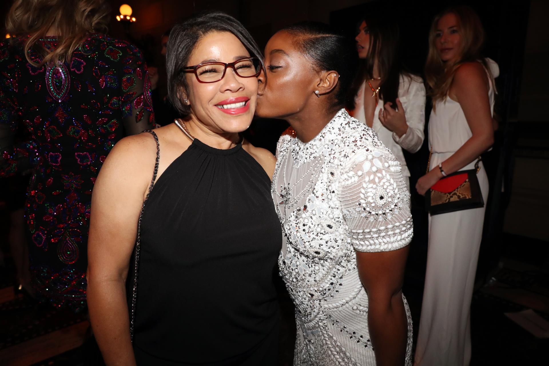 Simone Biles kissing her mom Nellie Biles' cheek in 2016.