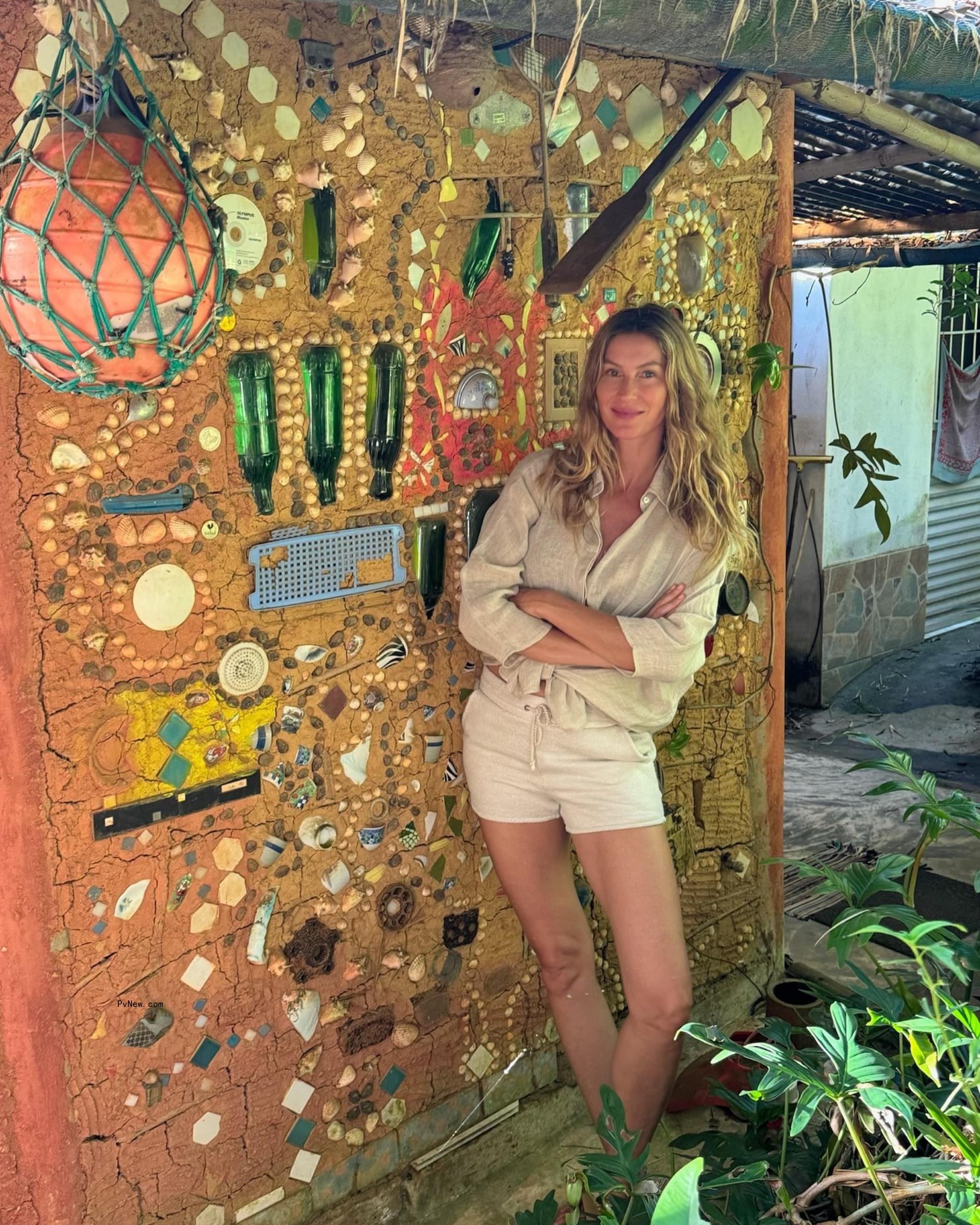 Gisele Bundchen wearing a beige button-down in Brazil