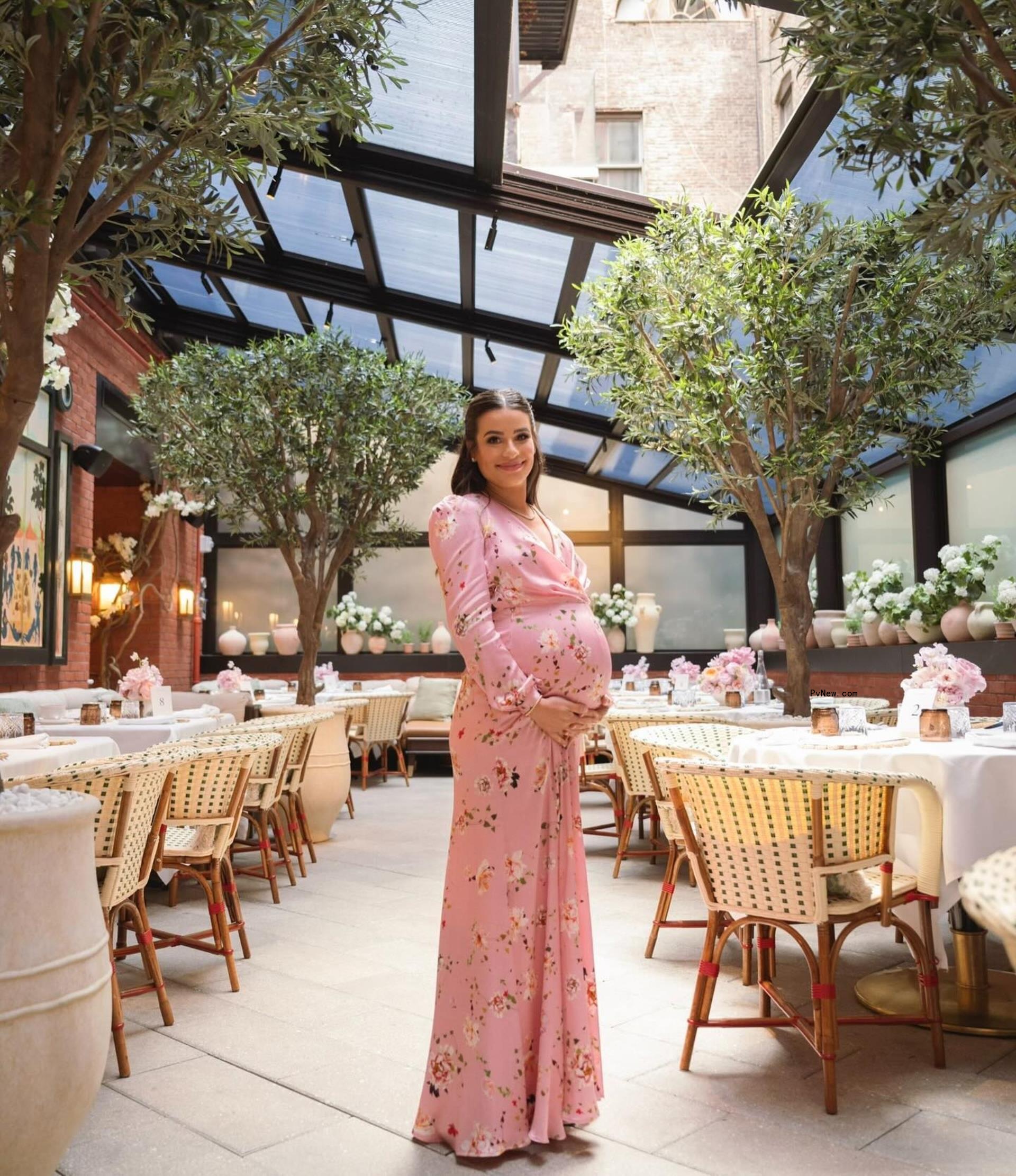 Michele wore a pink dress to her baby shower, as seen in this Instagram snap.
