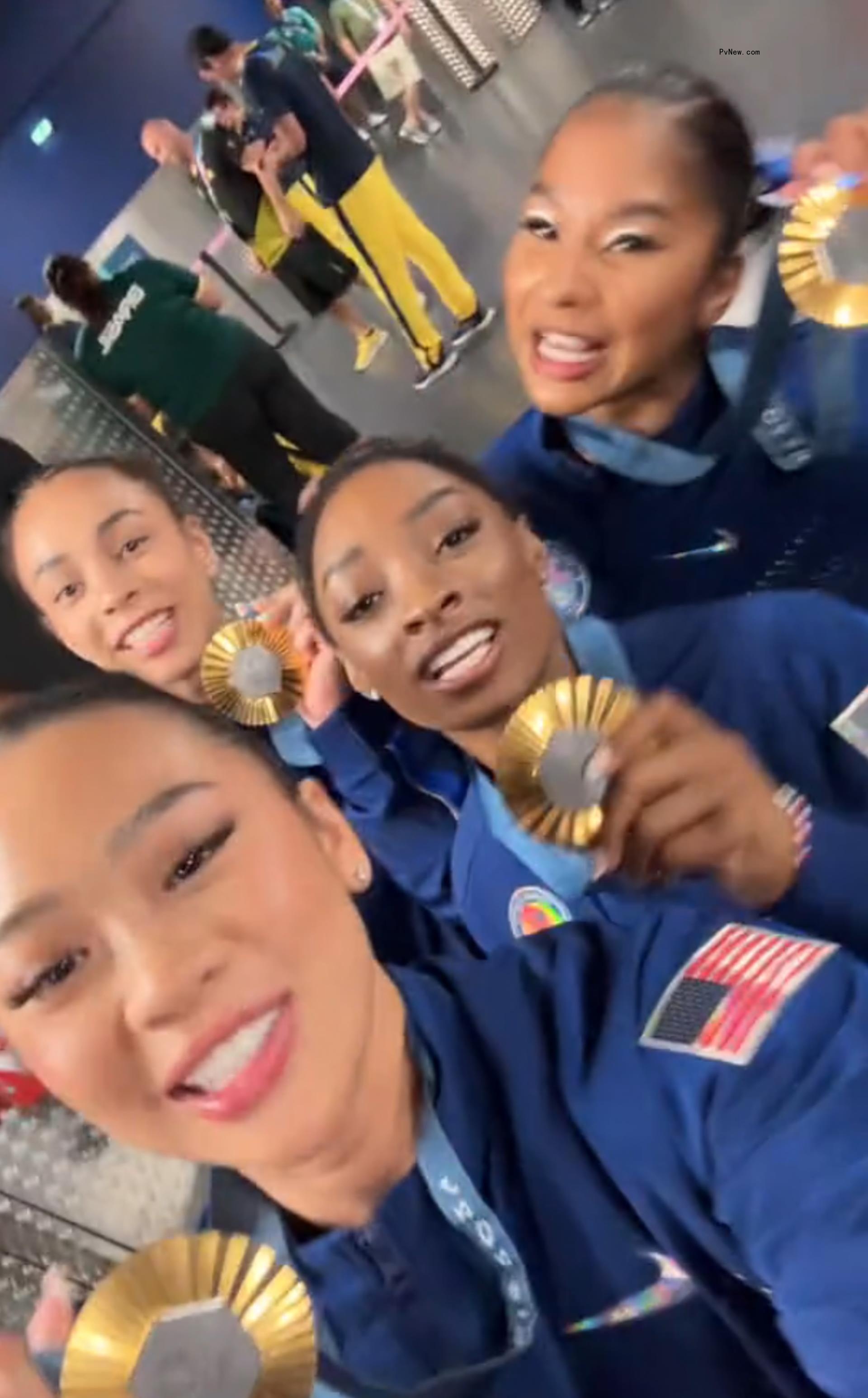 Simone Biles and Suni Lee with Hezly Rivera and Jordan Chiles celebrating their 2024 Olympics gold medal win in a TikTok video