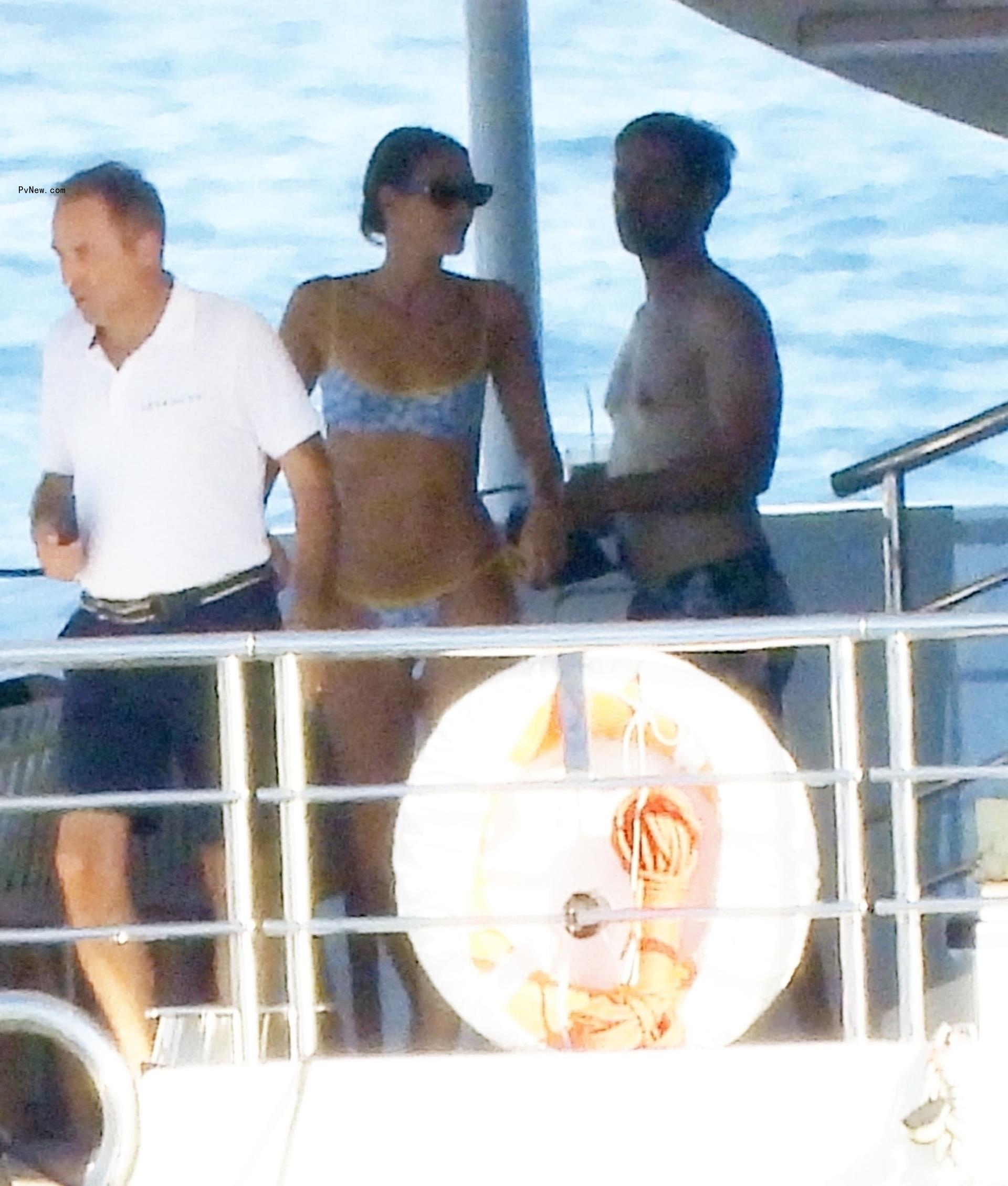 Vittoria Ceretti and Tobey Maguire on a yacht in Portofino, Italy on July 30, 2024.