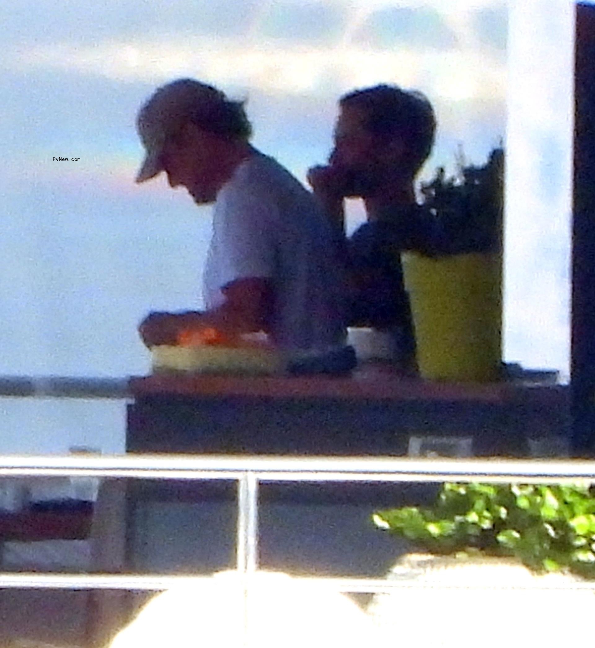 Leo<i></i>nardo DiCaprio and Tobey Maguire on a yacht in Portofino, Italy on July 30, 2024.