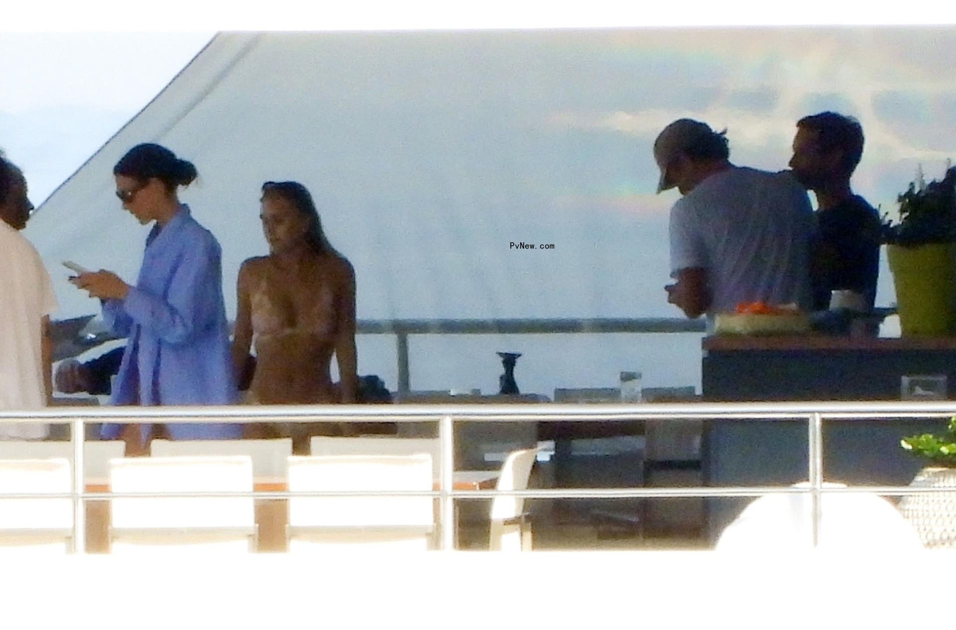 Leo<i></i>nardo DiCaprio, Vittoria Ceretti and Tobey Maguire on a yacht in Portofino, Italy on July 30, 2024.