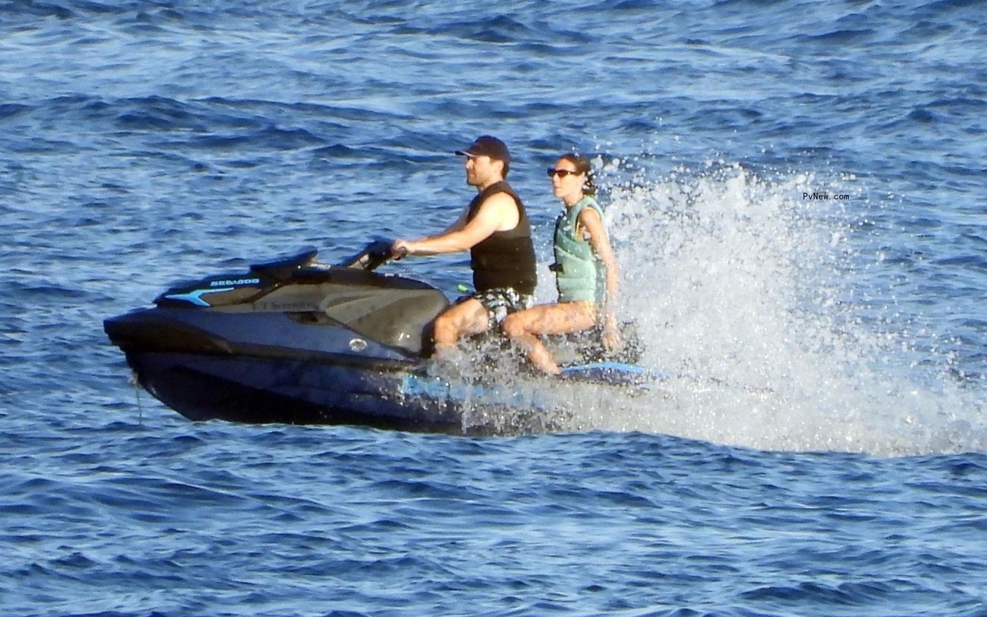 Vittoria Ceretti on a jet ski with Tobey Maguire while yachting in Portofino, Italy on July 30, 2024.