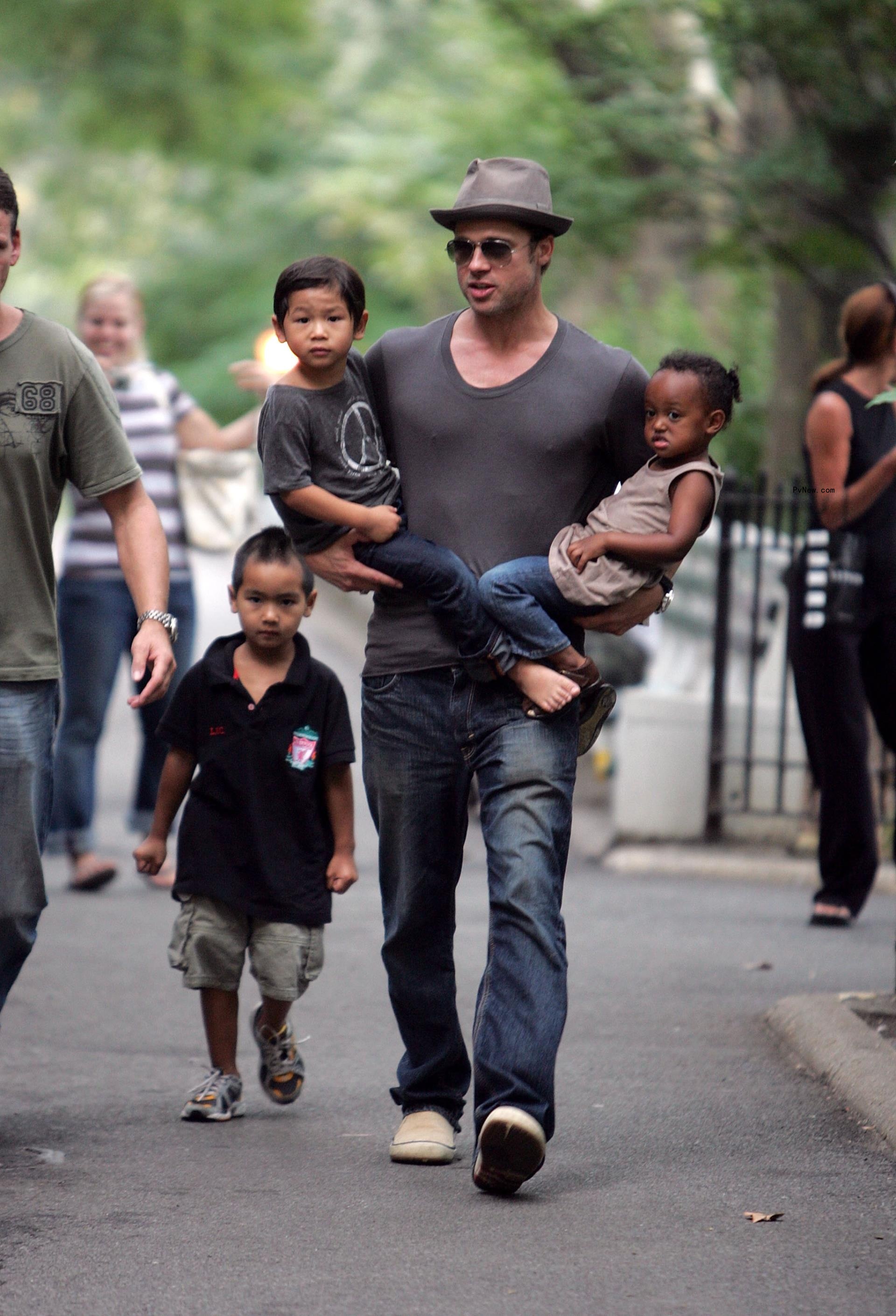 Brad Pitt with Zahara, Pax and Maddox in New York in 2007.