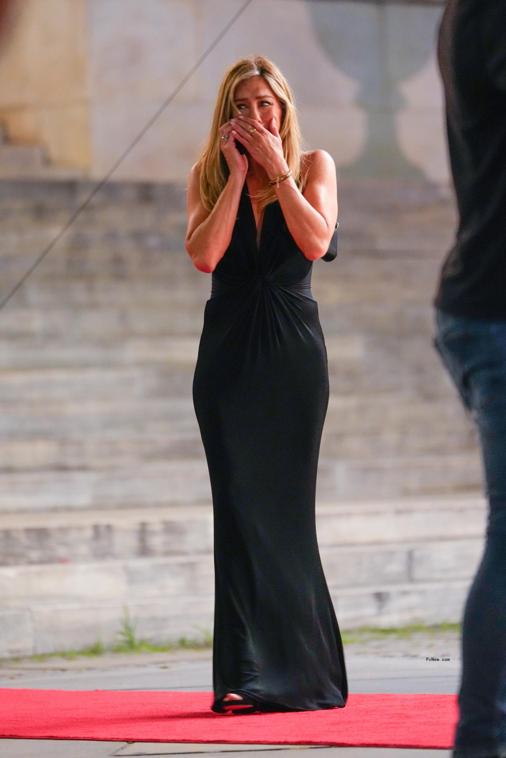 Jennifer Aniston walking and crying while filming