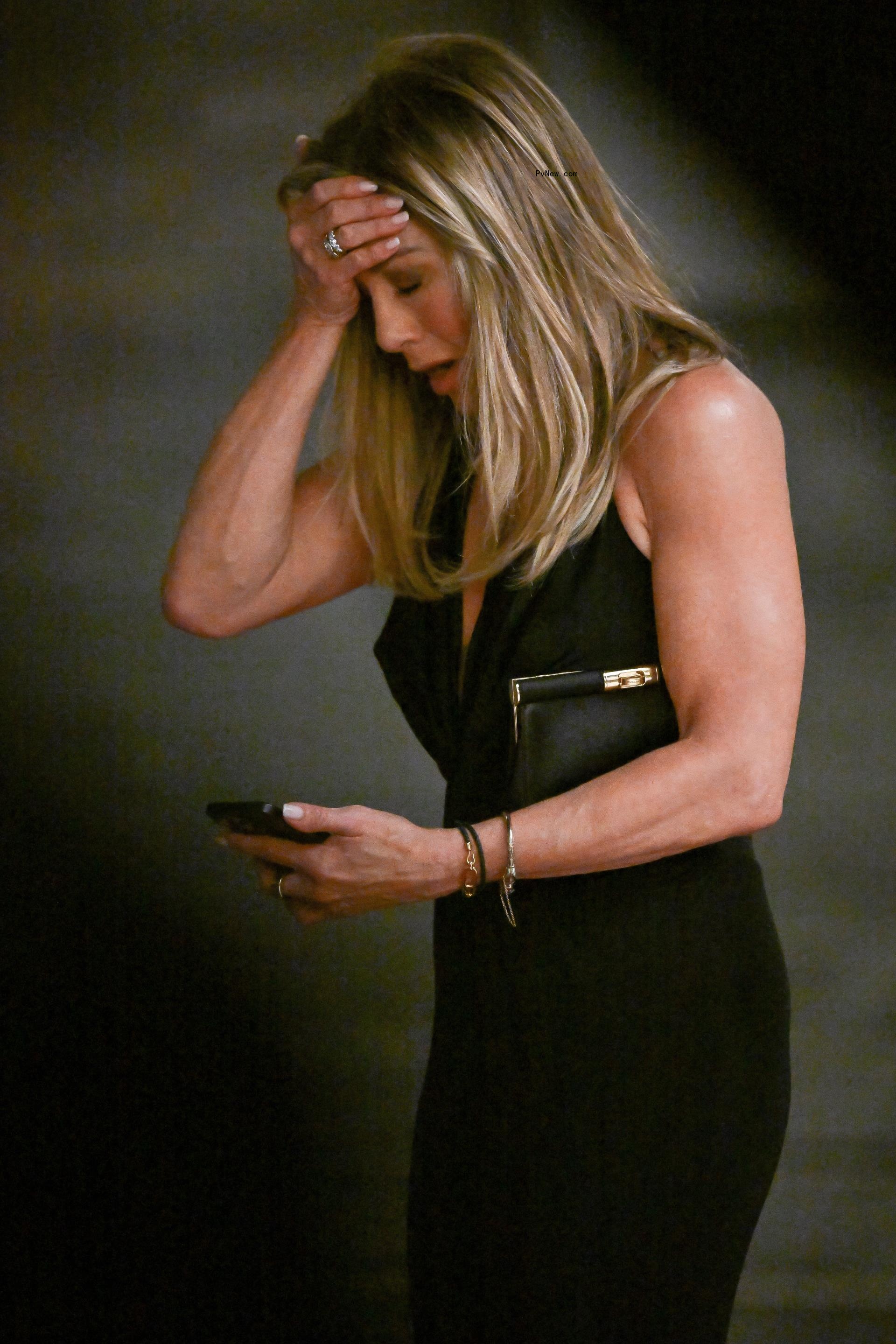 Jennifer Aniston walking and crying while filming