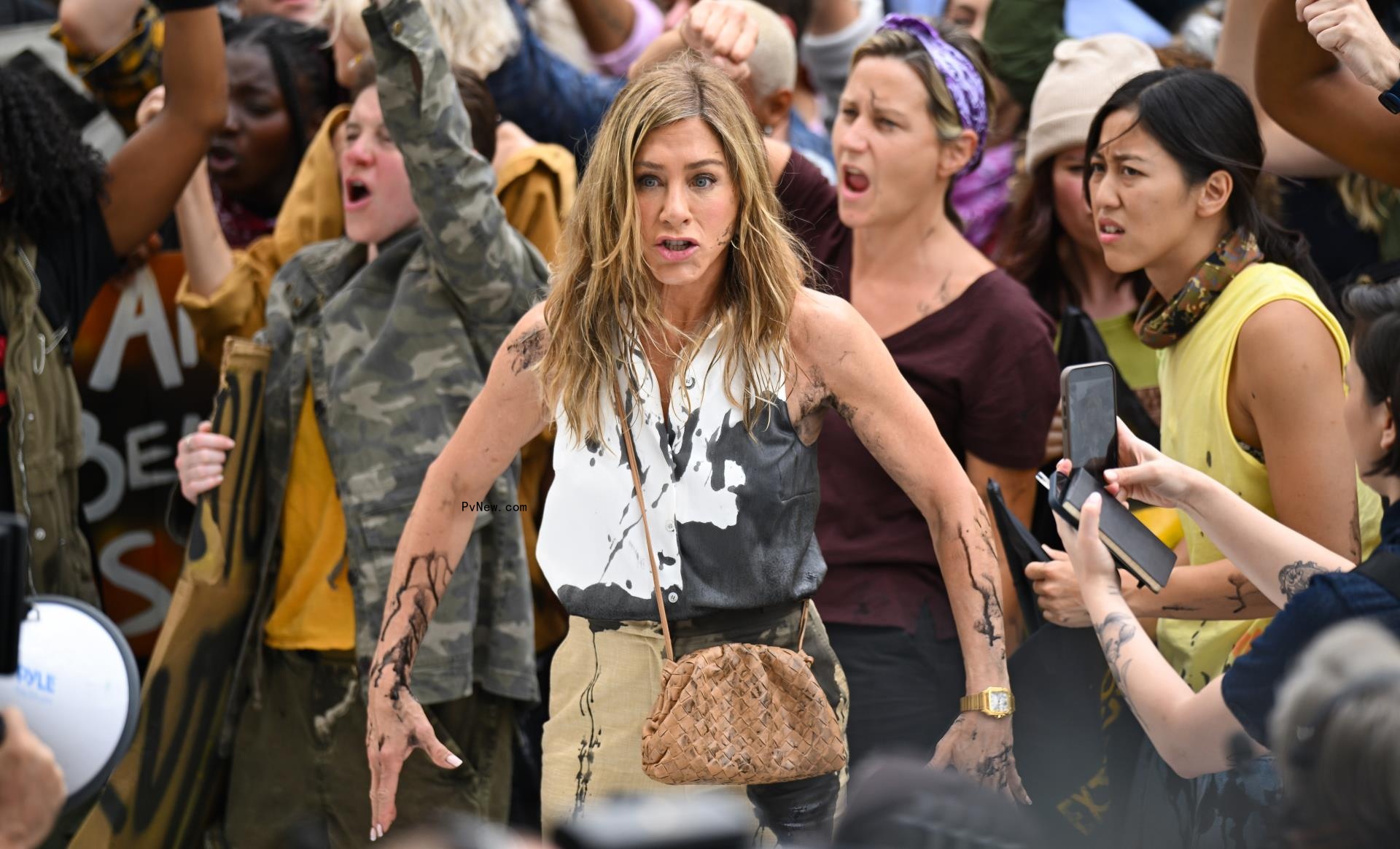 Jennifer Aniston with fake oil on her