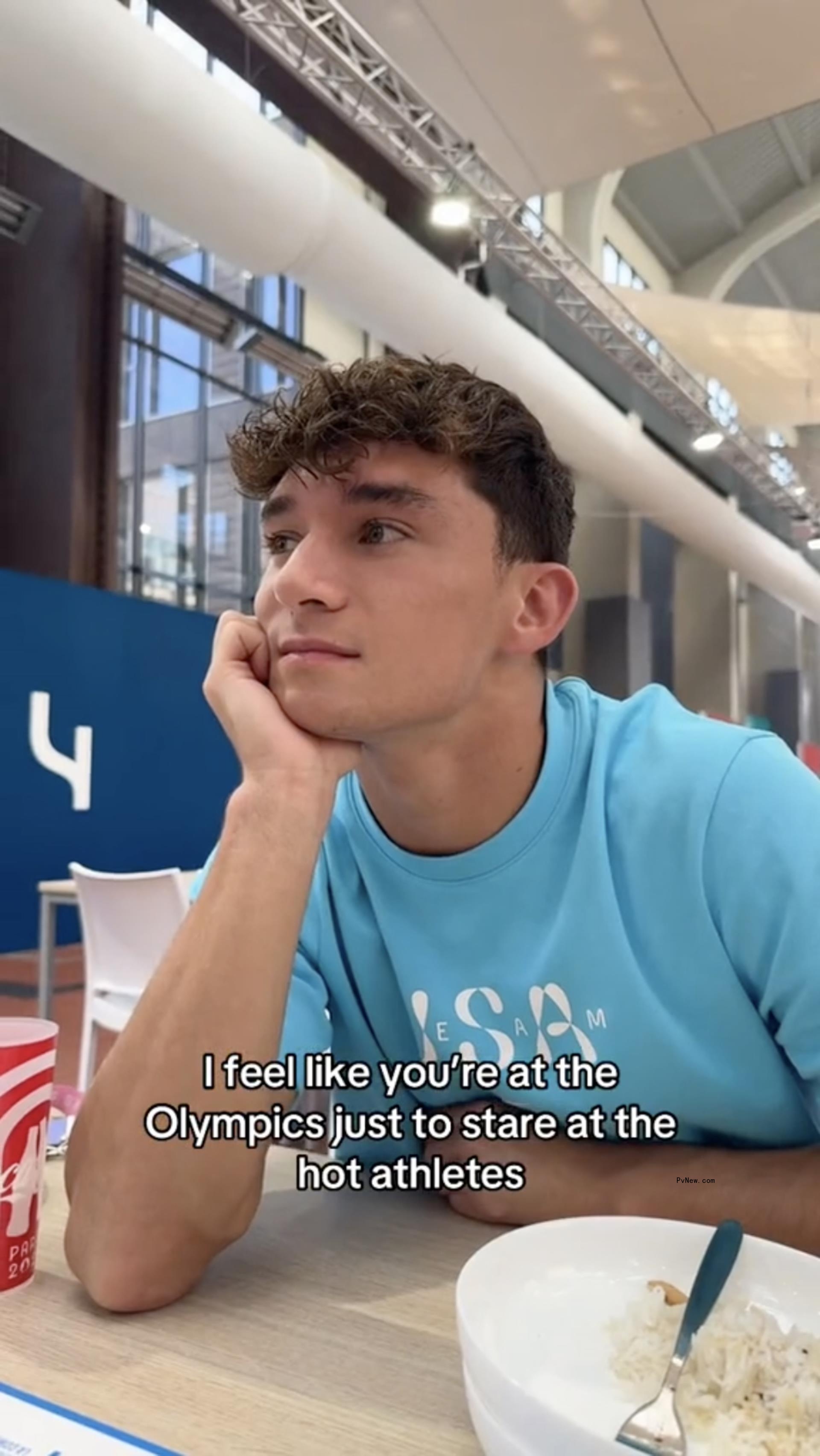 Tyler Downs staring in the dining hall.