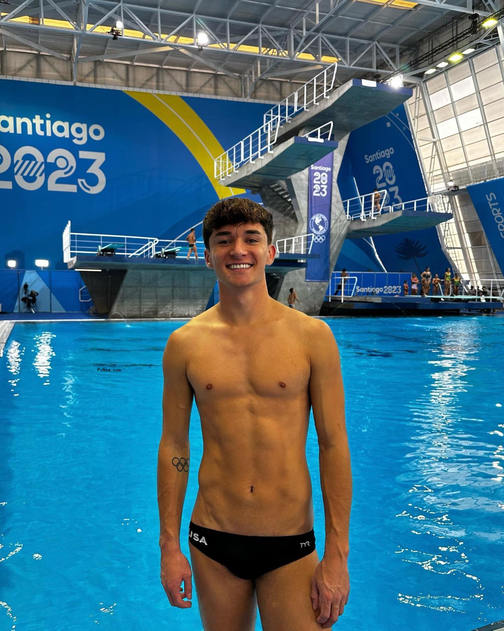 Tyler Downs by a pool at the 2023 Pan American Games.
