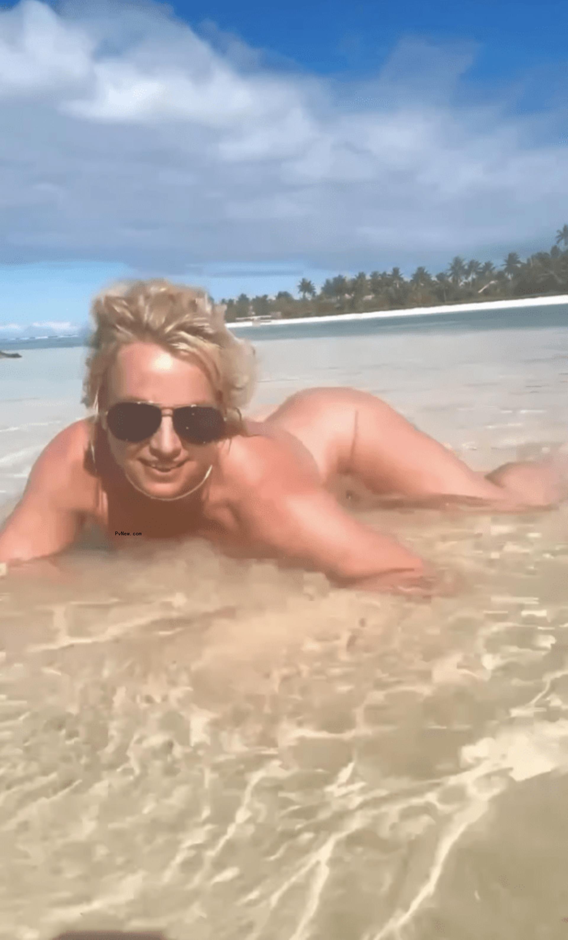 Britney Spears naked in the ocean.